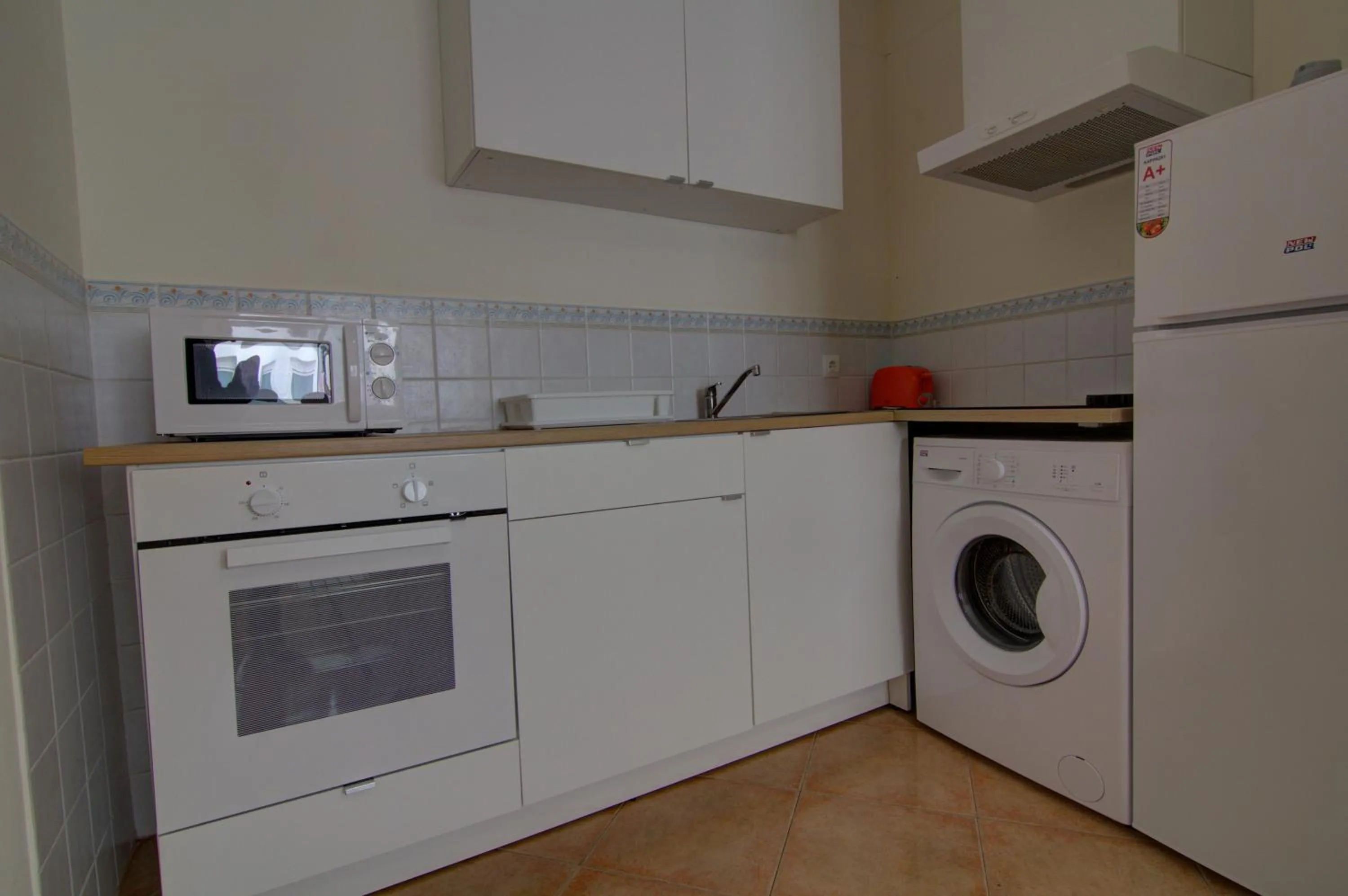Kitchen or kitchenette in Apartamentos Centro 2 el Puerto