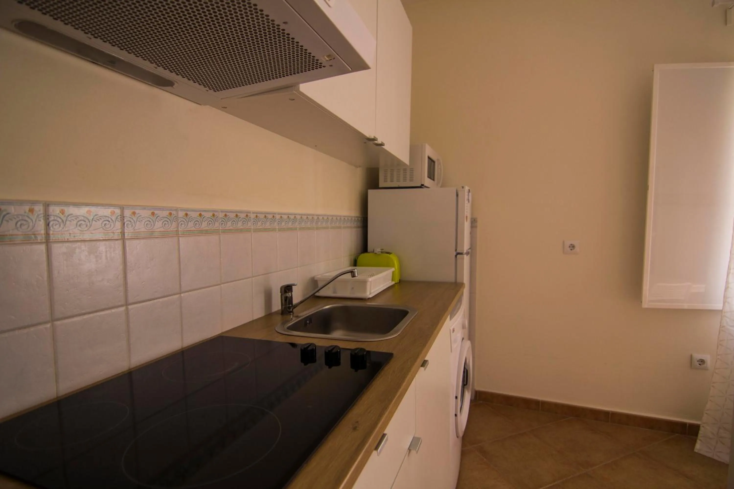 Kitchen or kitchenette in Apartamentos Centro 2 el Puerto