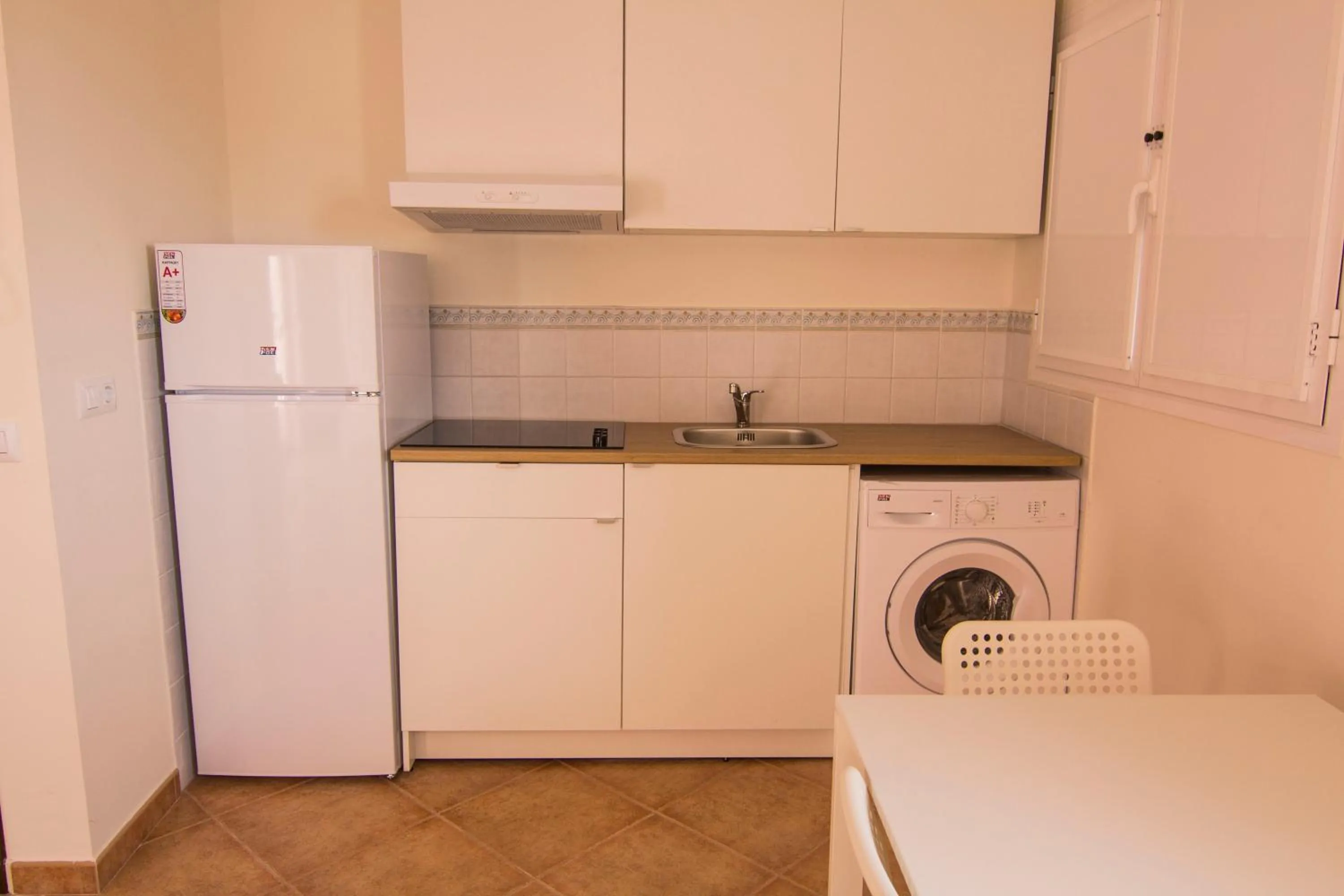 Kitchen or kitchenette in Apartamentos Centro 2 el Puerto