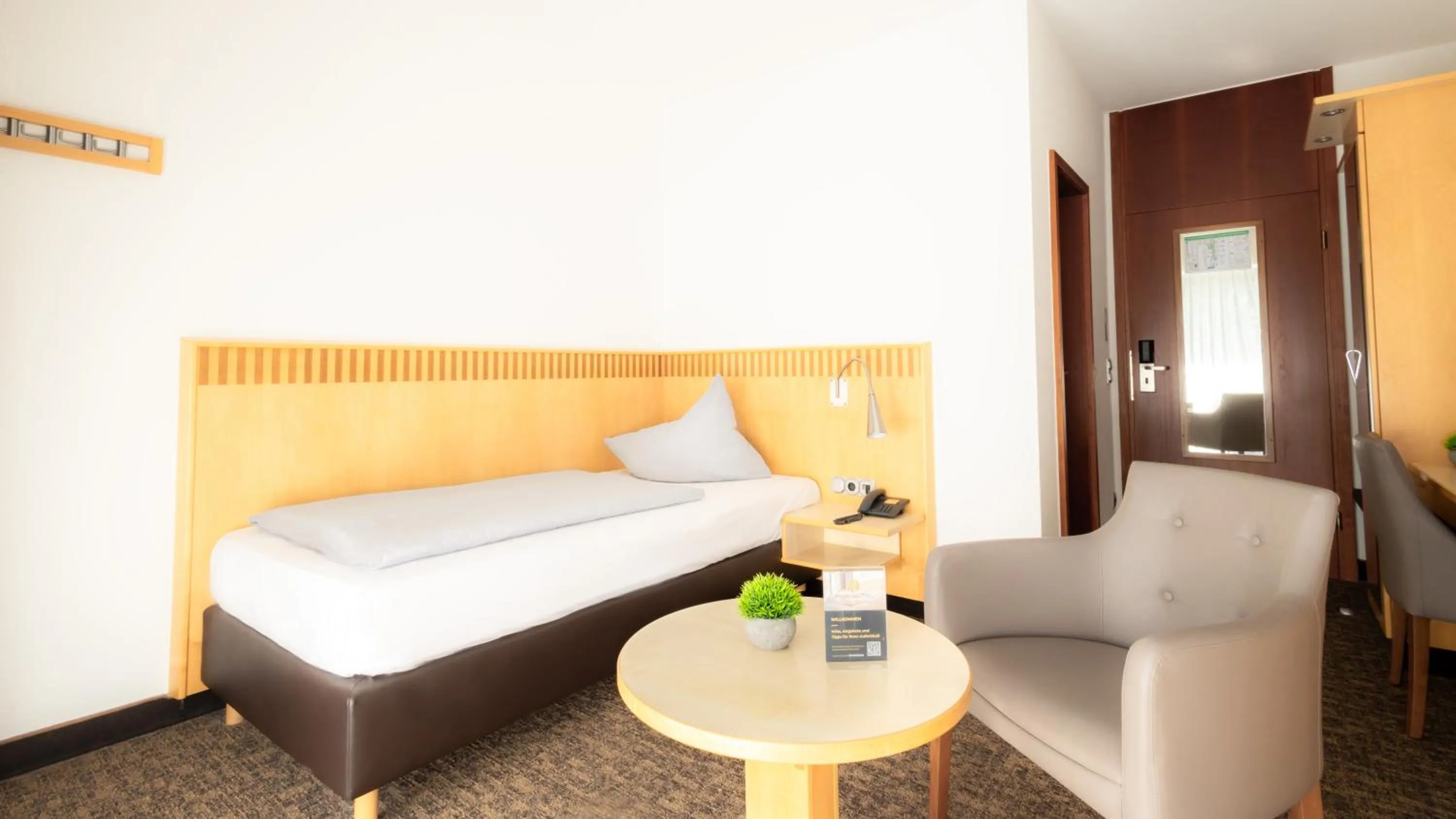 Photo of the whole room, Bed in Parkhotel Nümbrecht