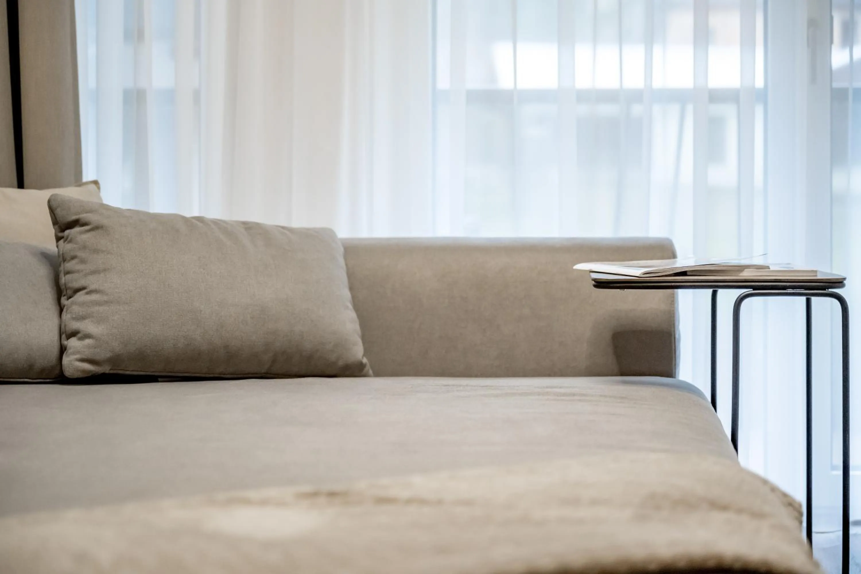 Living room, Bed in Appartements Perberschlager