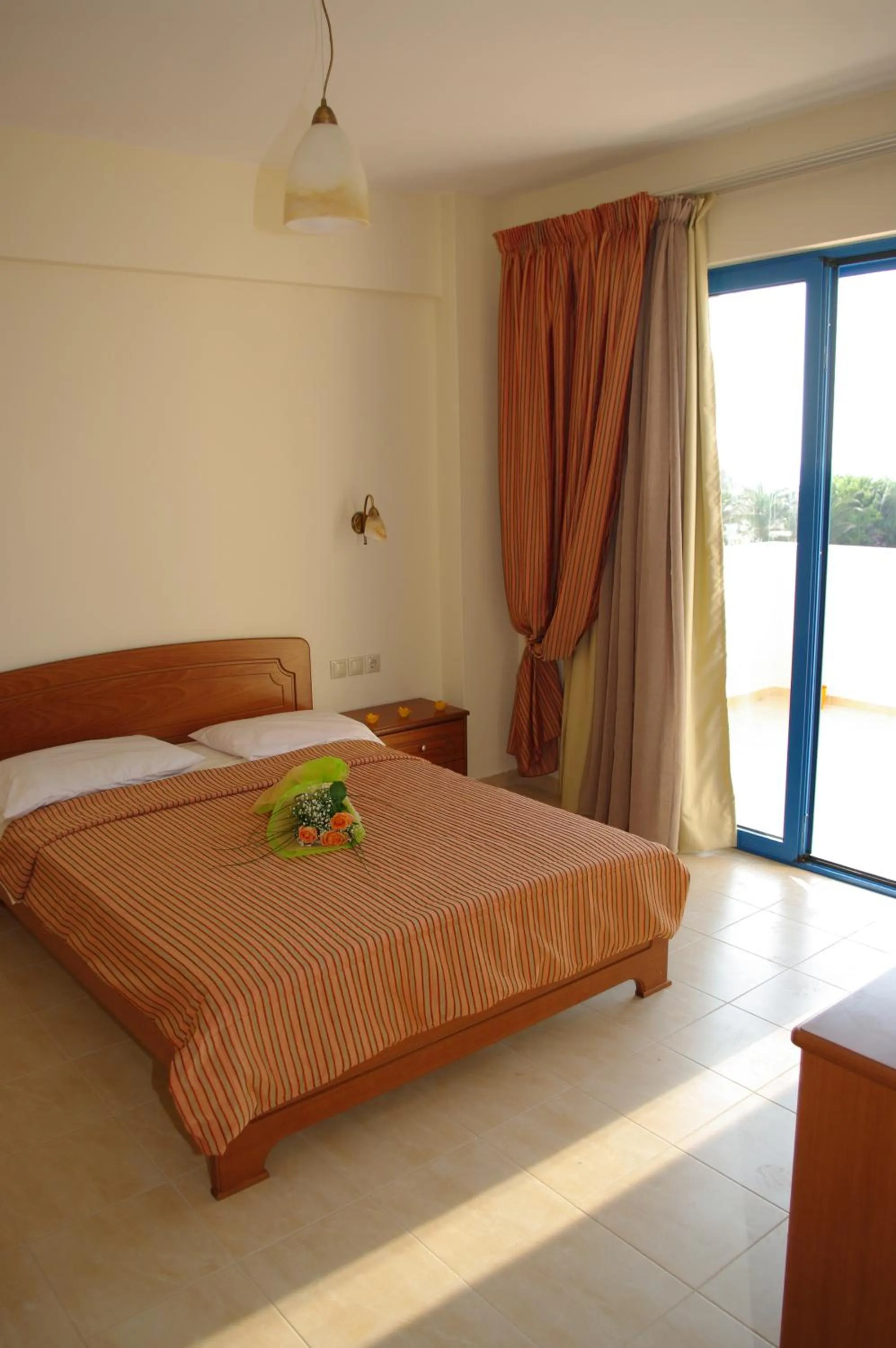 Staff, Bed in Gold Apartments