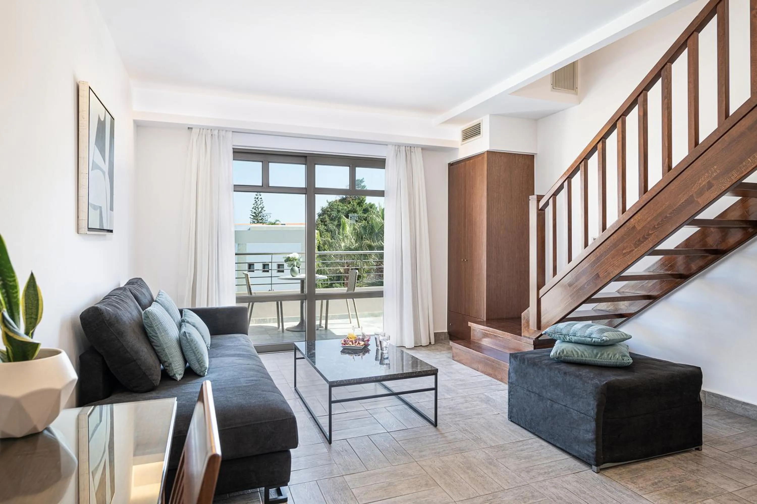 Living room in Porto Platanias Beach Resort & Spa