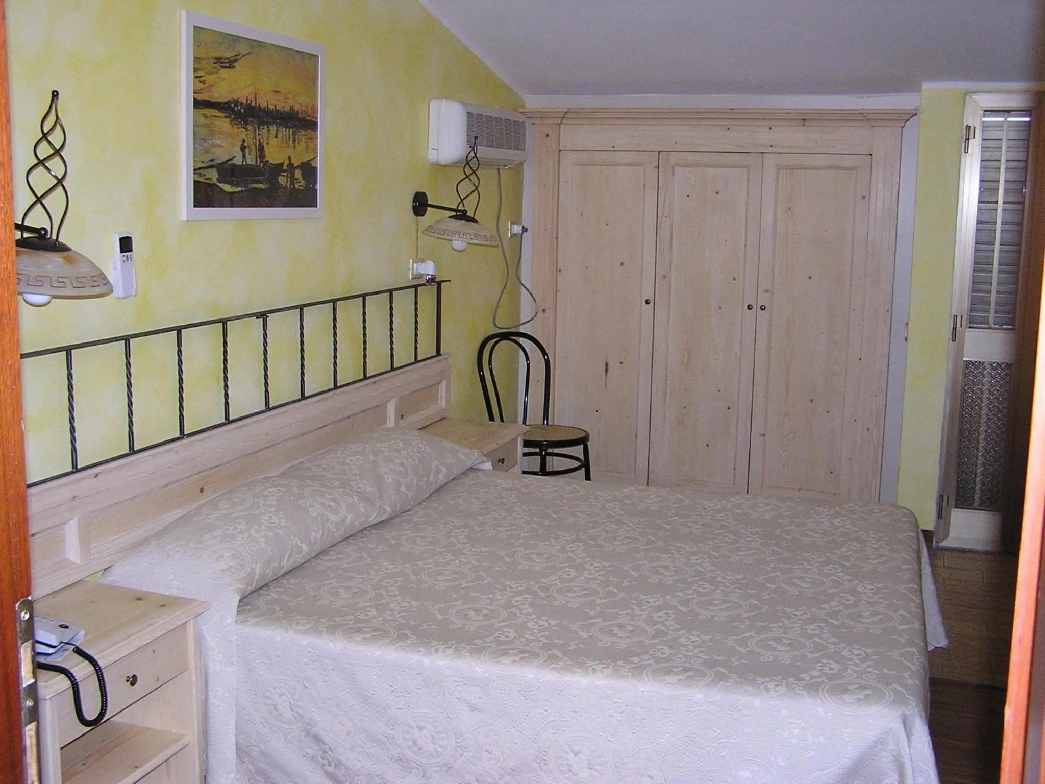 Bed in Hotel Mistral