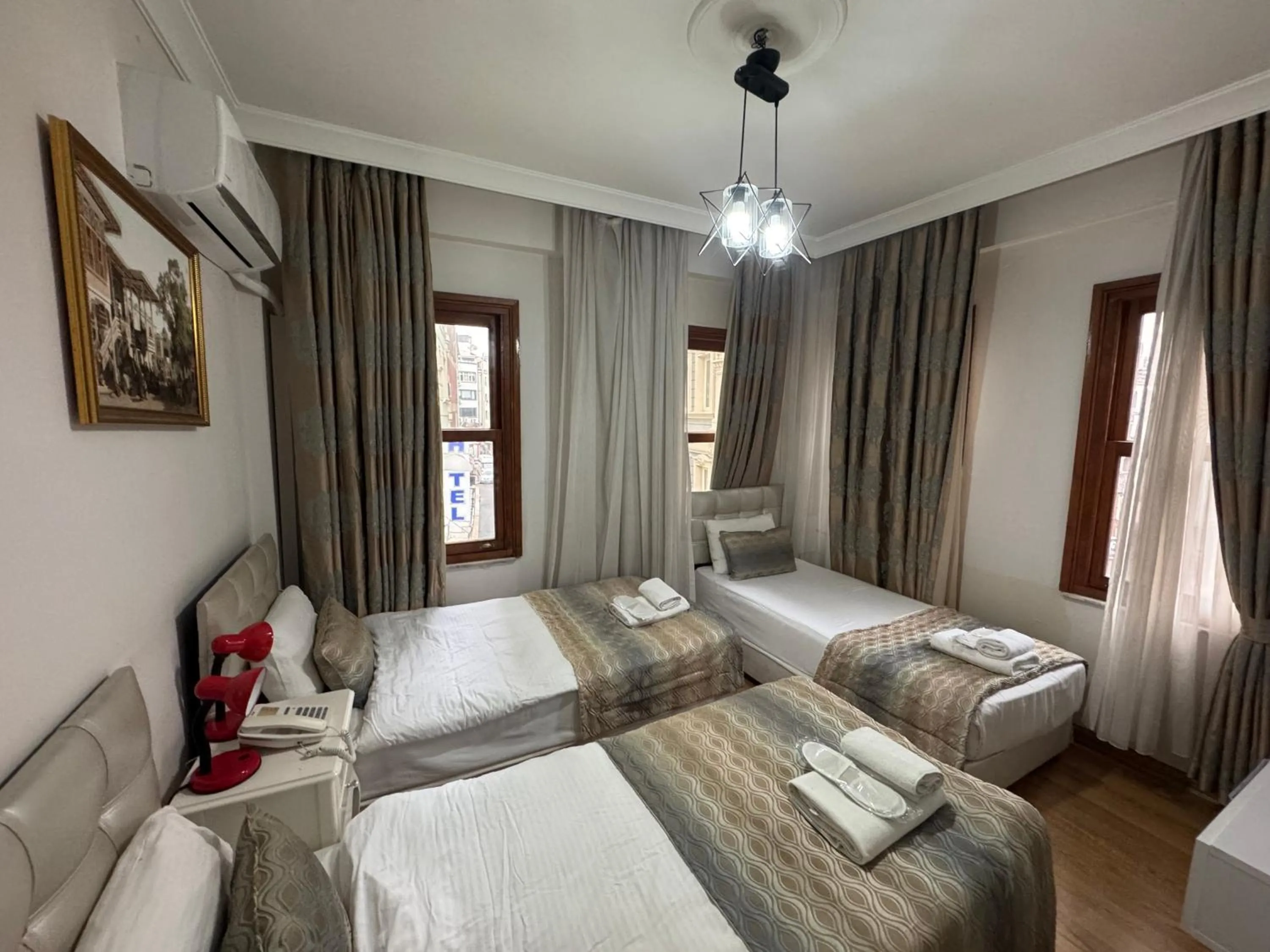 Bed in Rosalie Palace Hotel