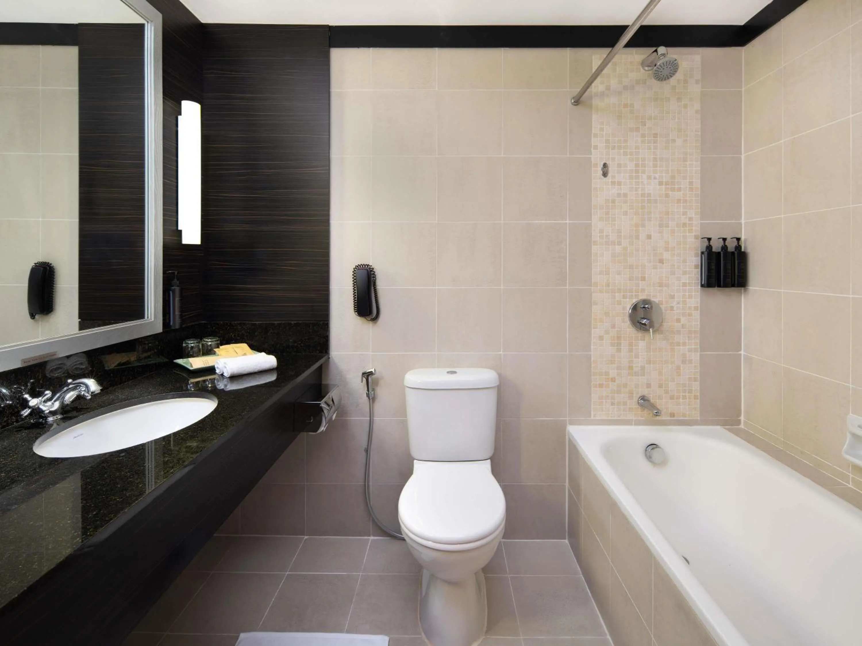 Bedroom in Grand Mercure Singapore Roxy