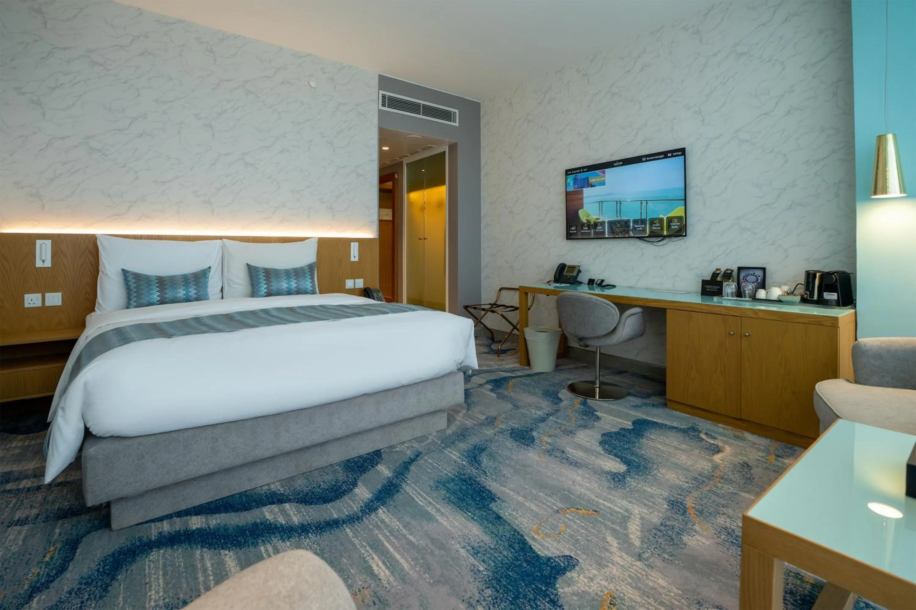 Photo of the whole room, Bed in Symphony Style Hotel Kuwait