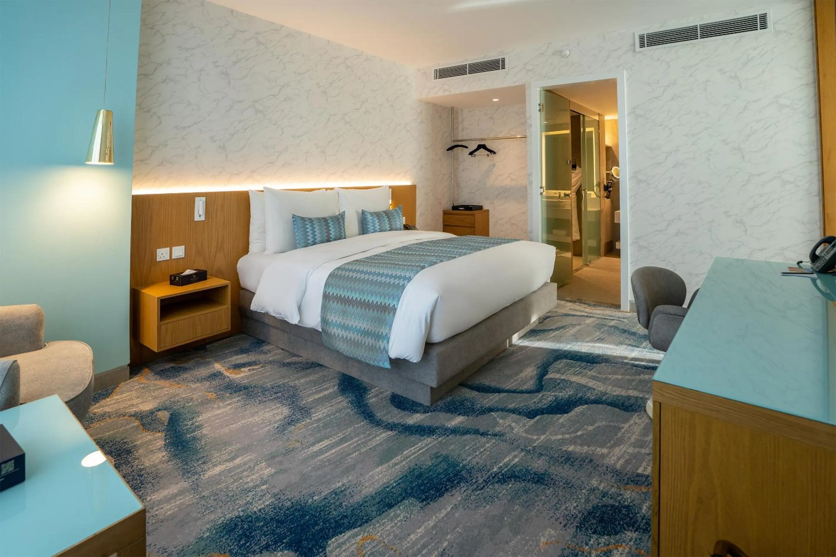 Photo of the whole room, Bed in Symphony Style Hotel Kuwait