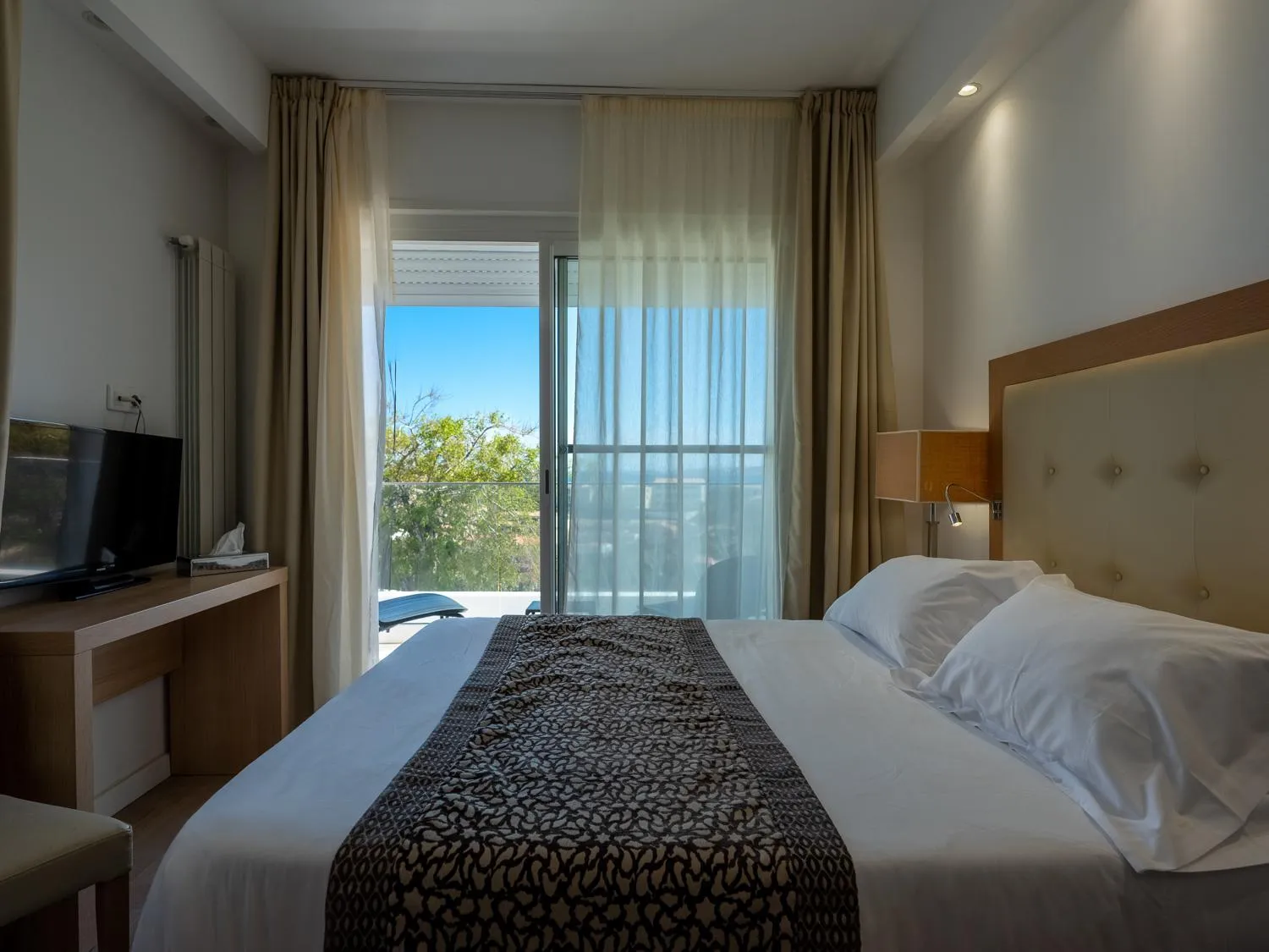 Photo of the whole room, Bed in Hotel Revellata & Spa