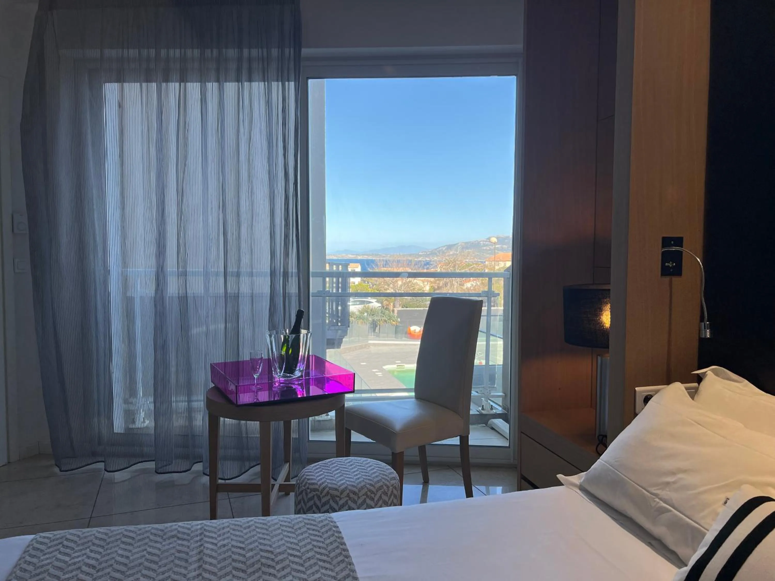 View (from property/room), Bed in Hotel Revellata & Spa