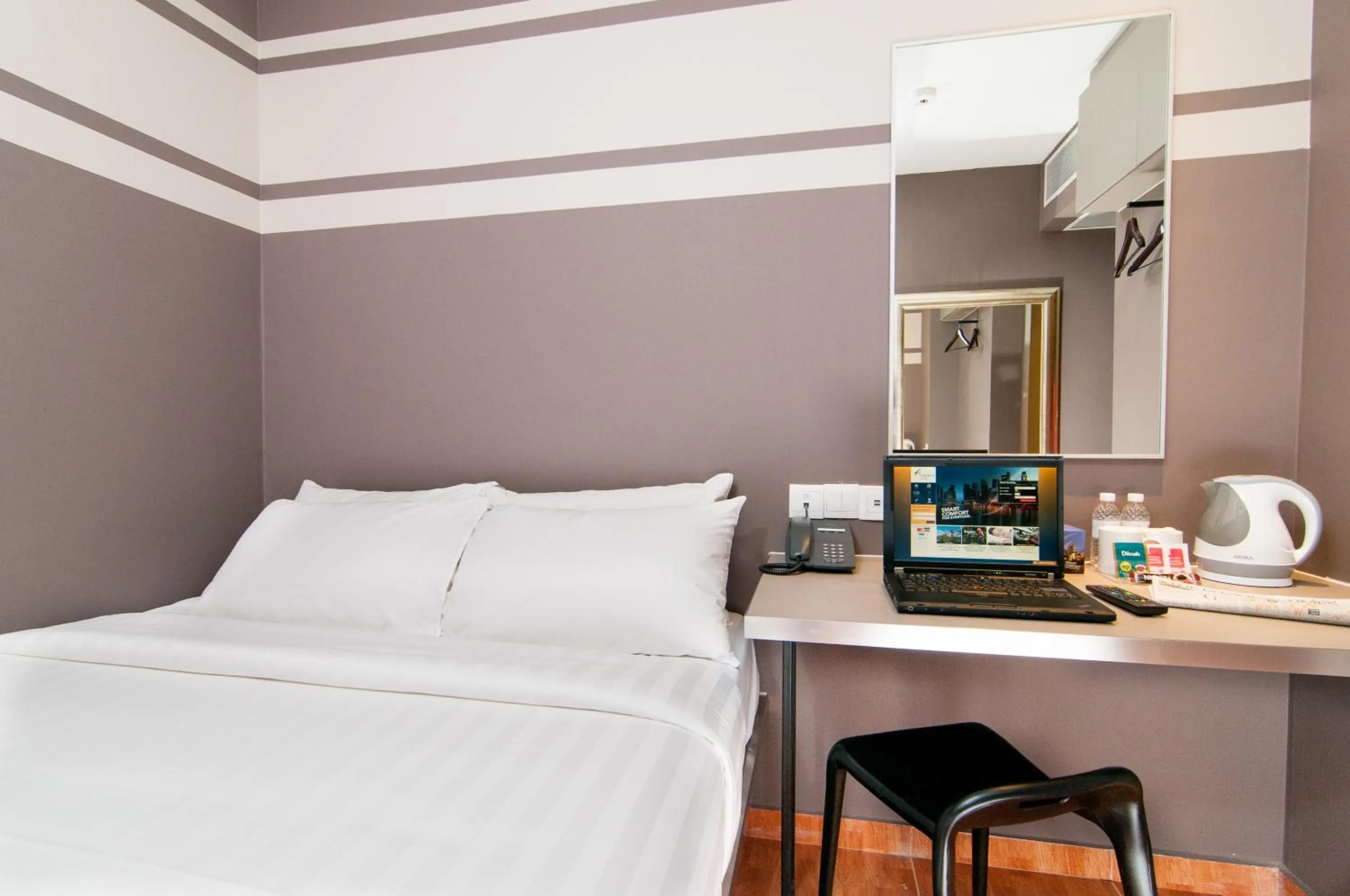 Photo of the whole room, Bed in Fragrance Hotel - Kovan