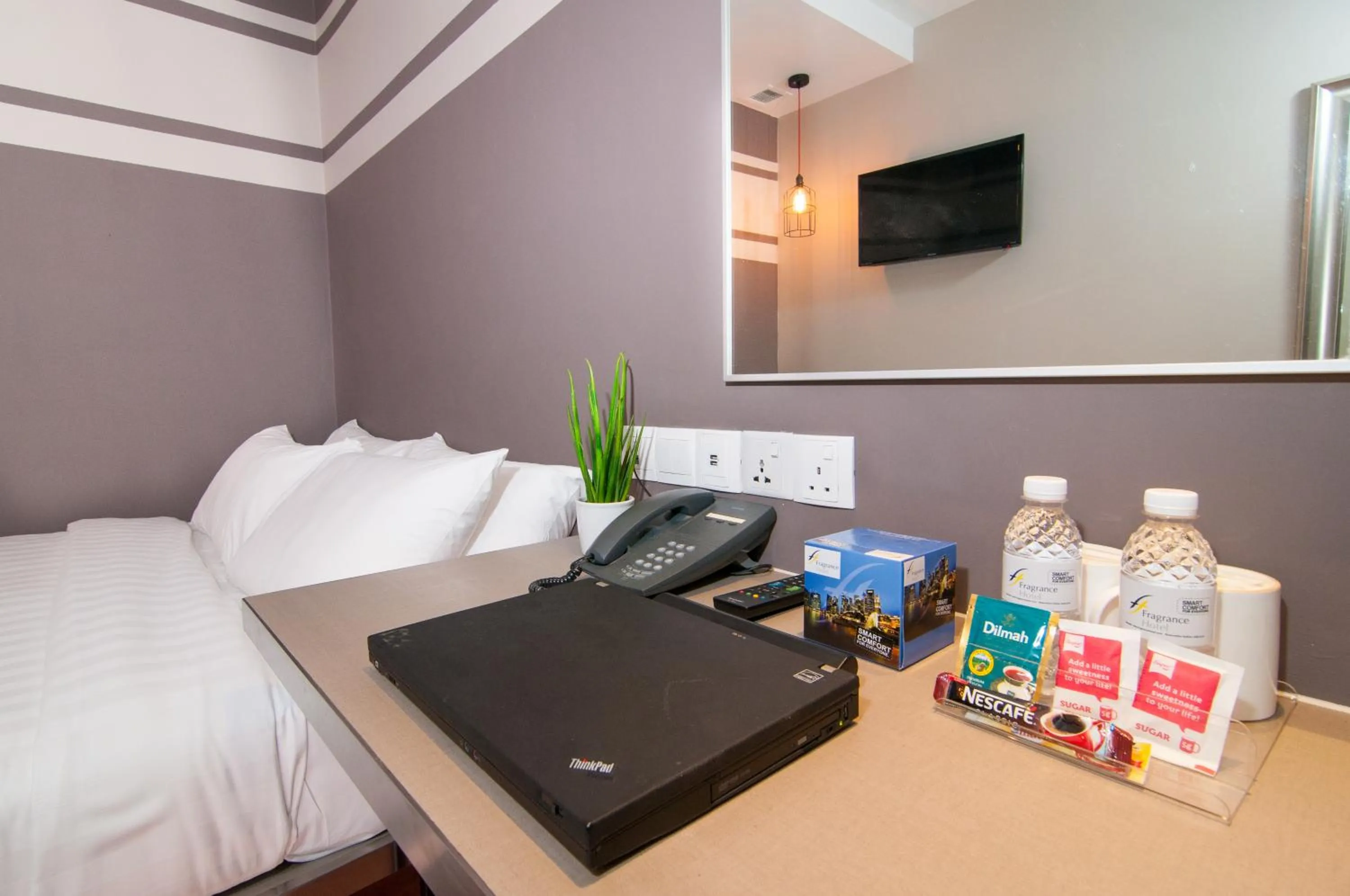 Photo of the whole room, Bed in Fragrance Hotel - Kovan