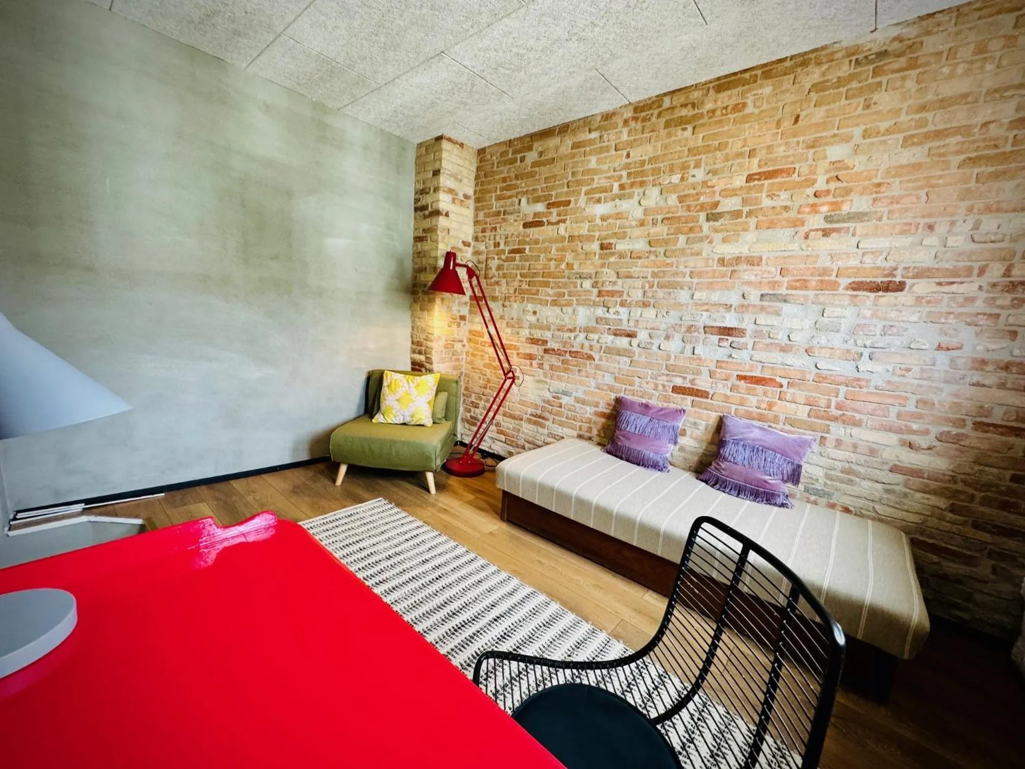 Living room, Bed in Hotel Gammel Havn