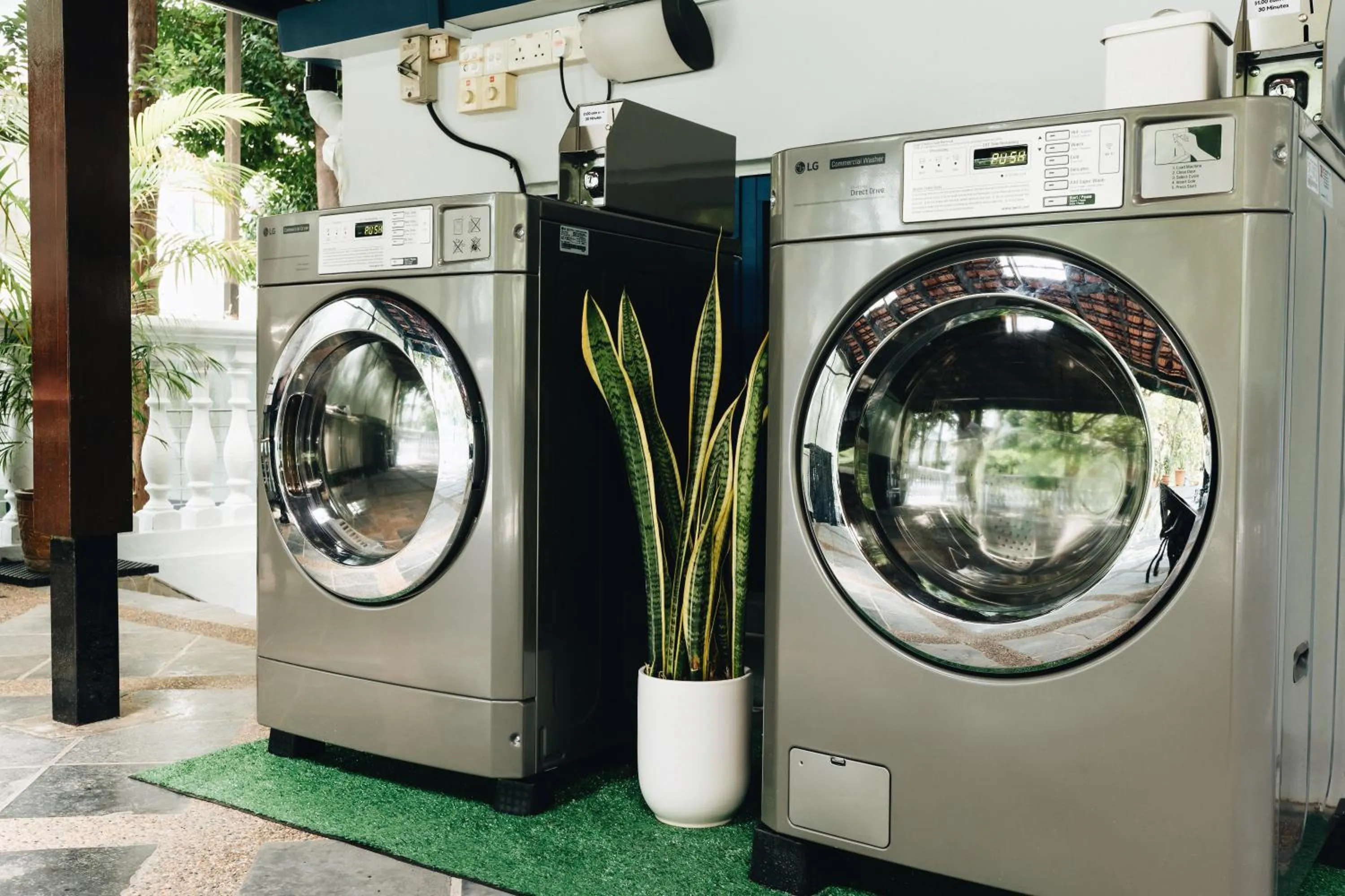 washing machine in Harbour Ville Hotel