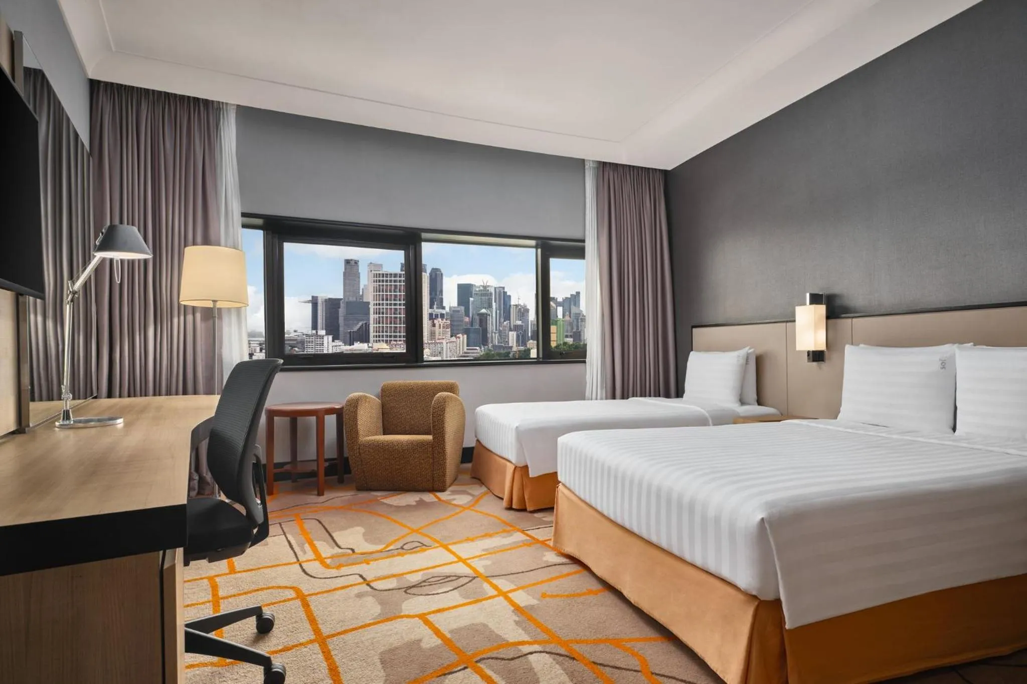 Photo of the whole room, Bed in Holiday Inn Singapore Atrium by IHG