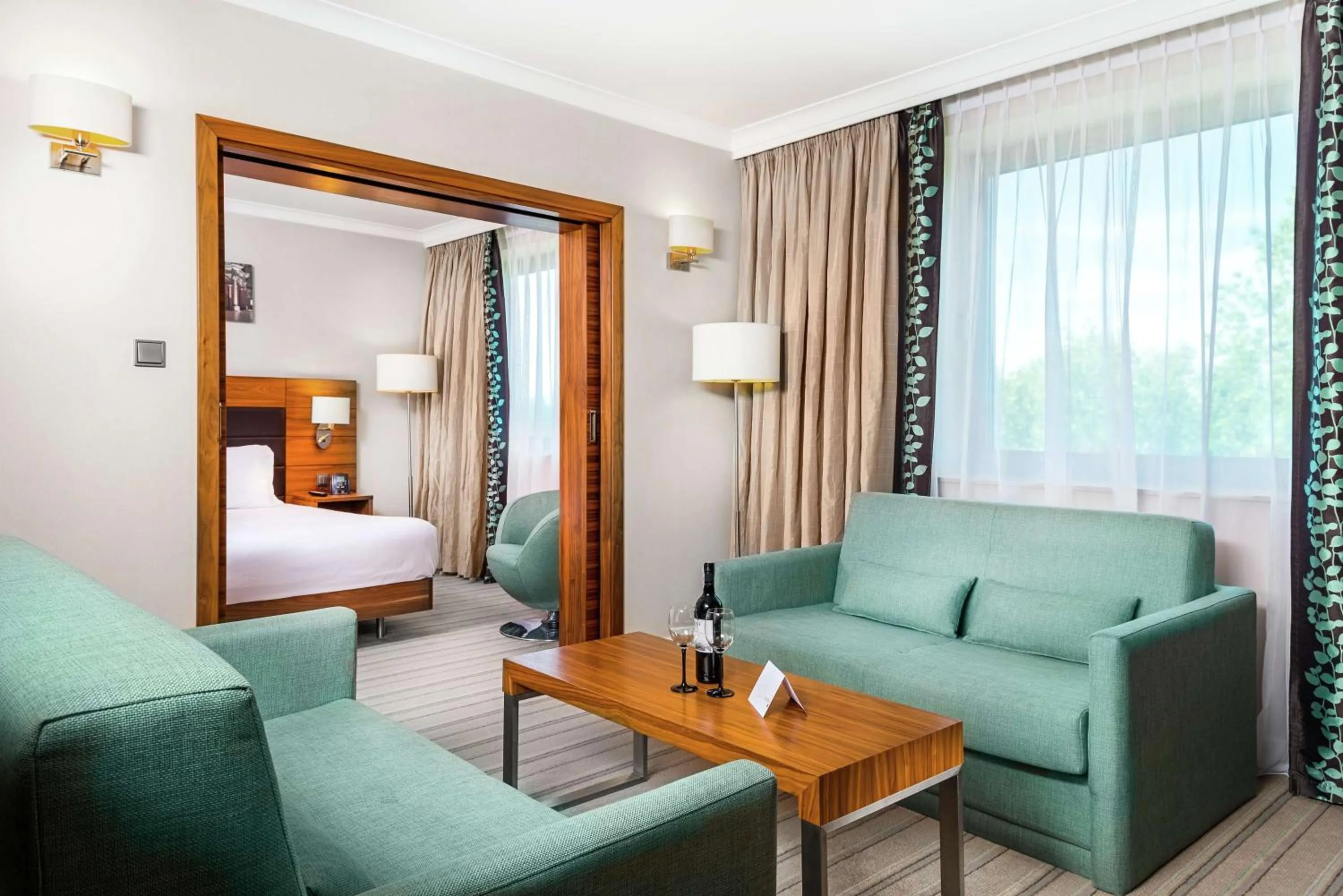 Living room, Bed in Hilton Garden Inn Krakow