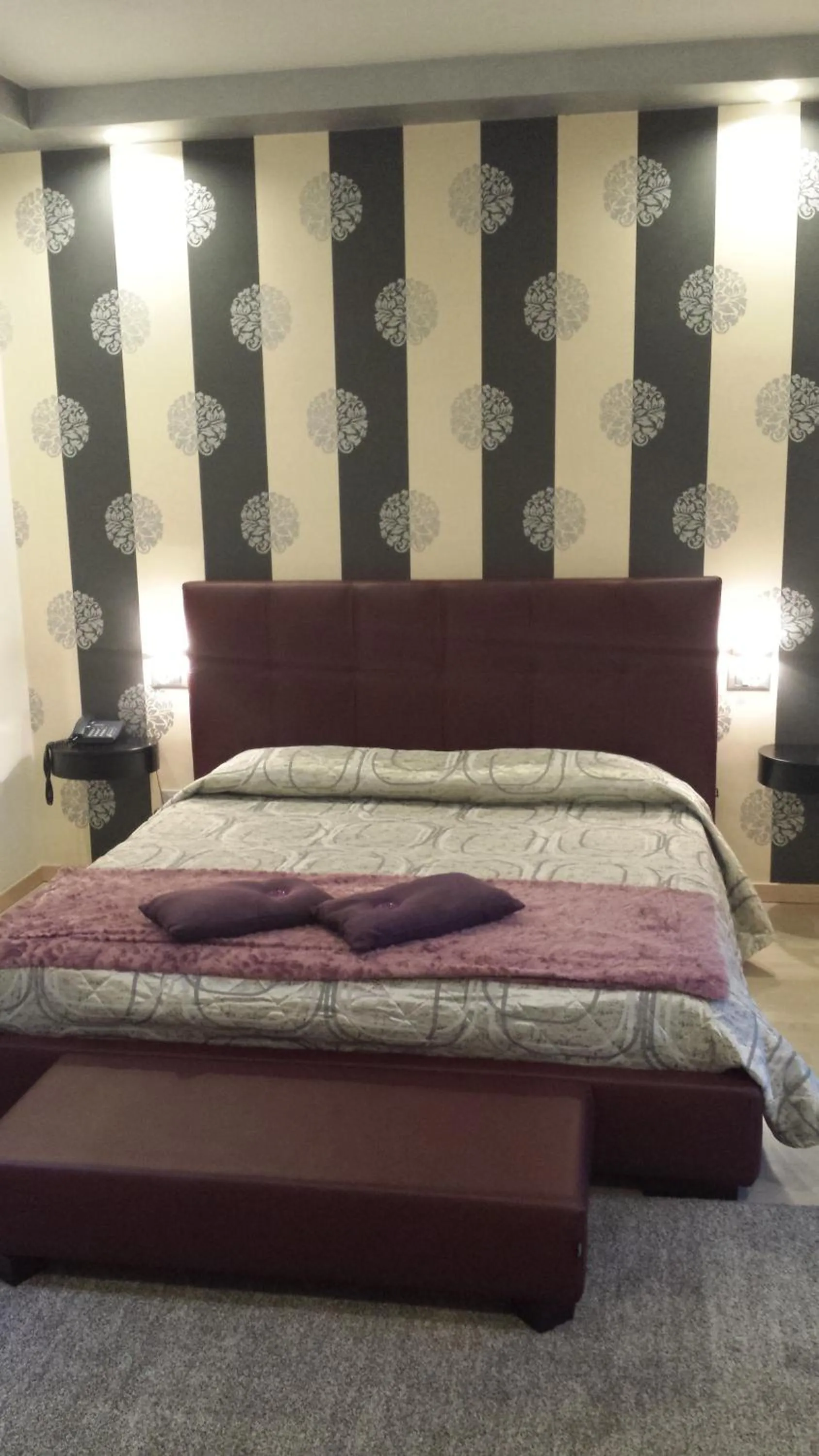 Bed in La Grotta Hotel