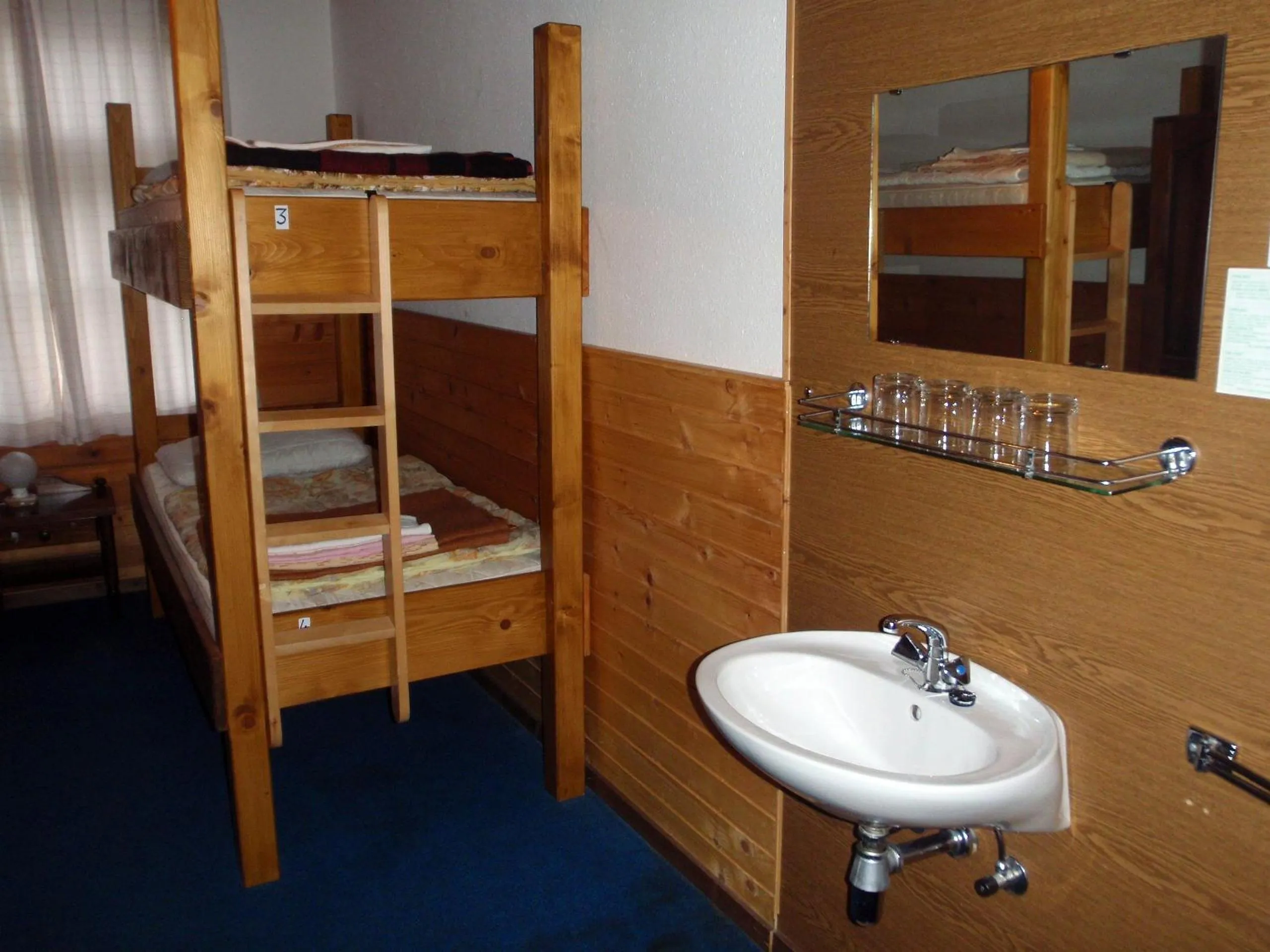 Bedroom in Hostel pod Voglom