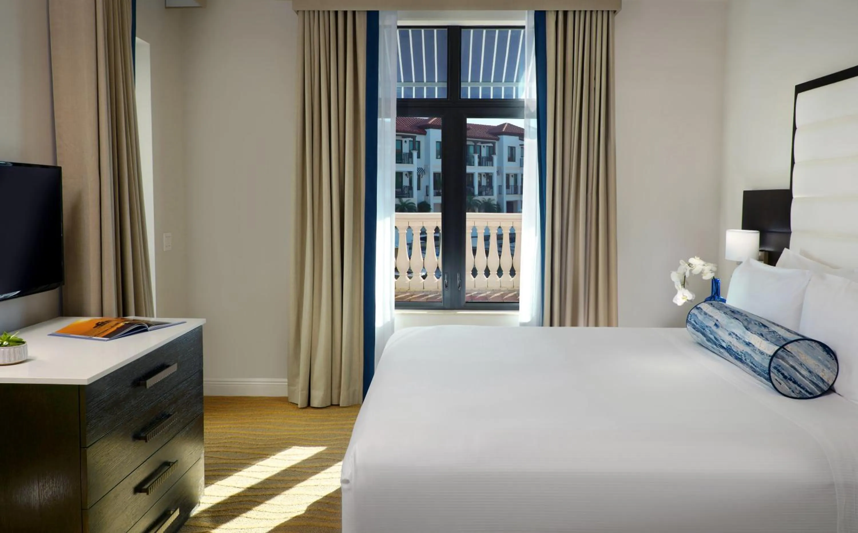 Bed in Naples Bay Resort and Marina