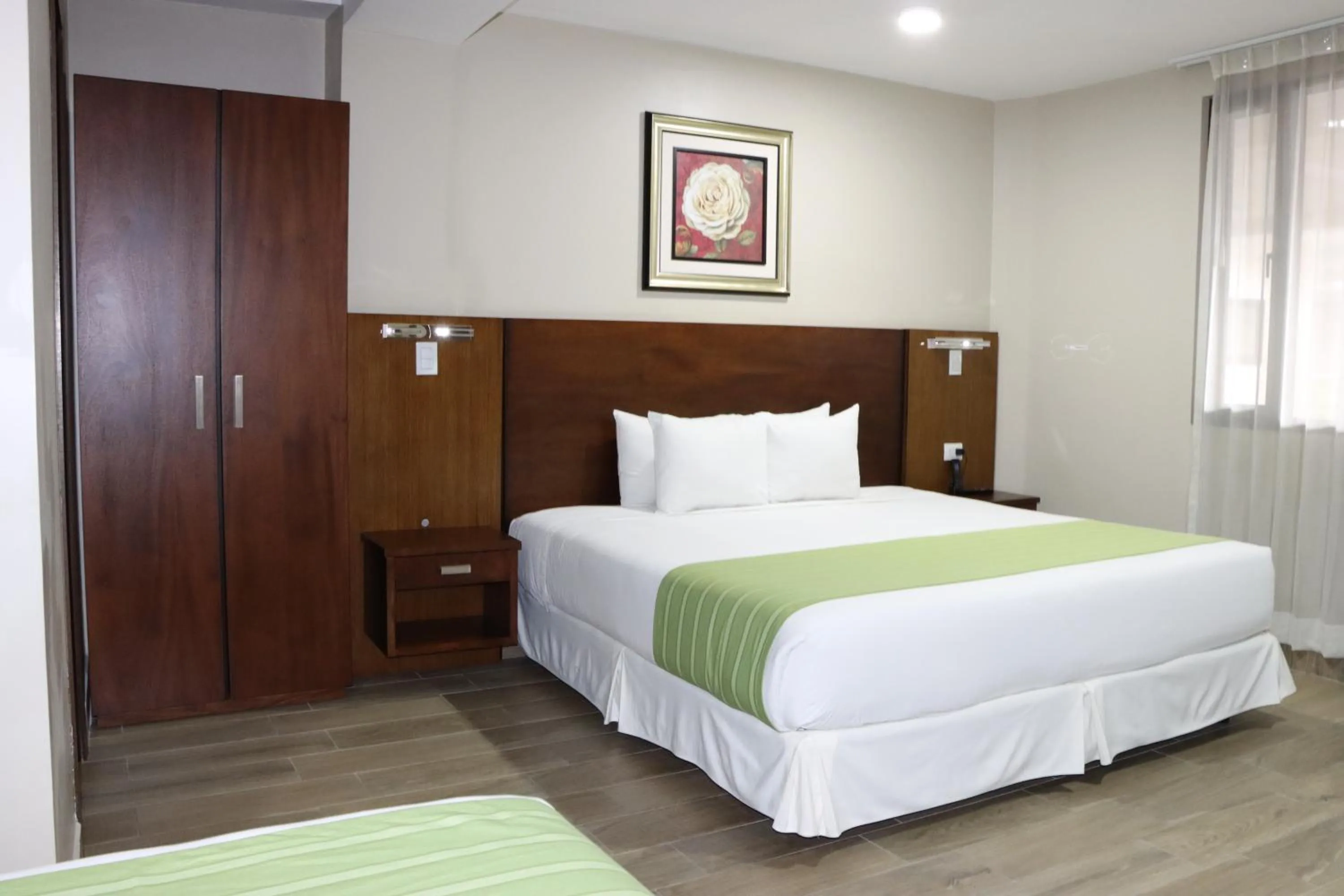 Bed in Hotel San Agustin Plaza