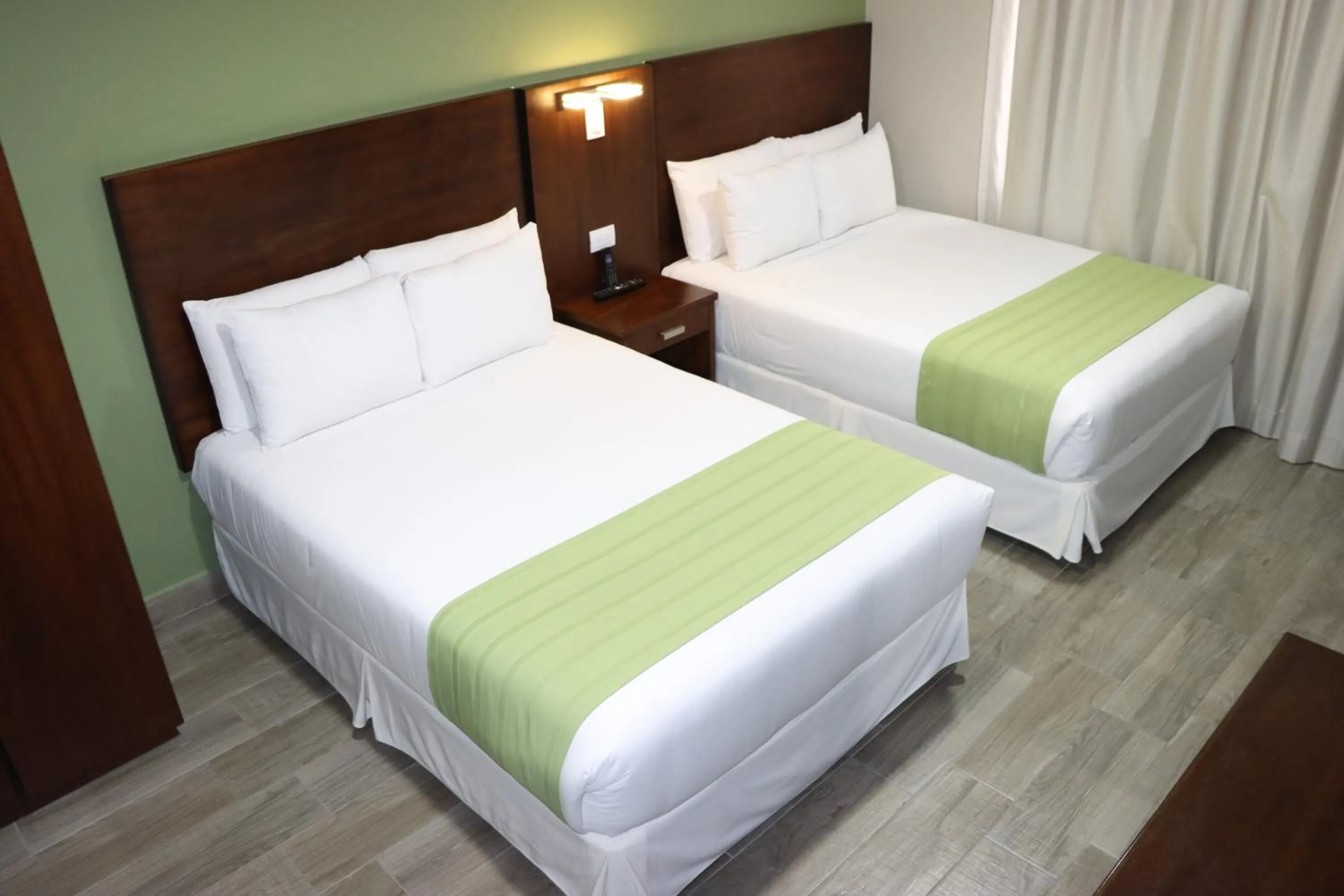 Bed in Hotel San Agustin Plaza