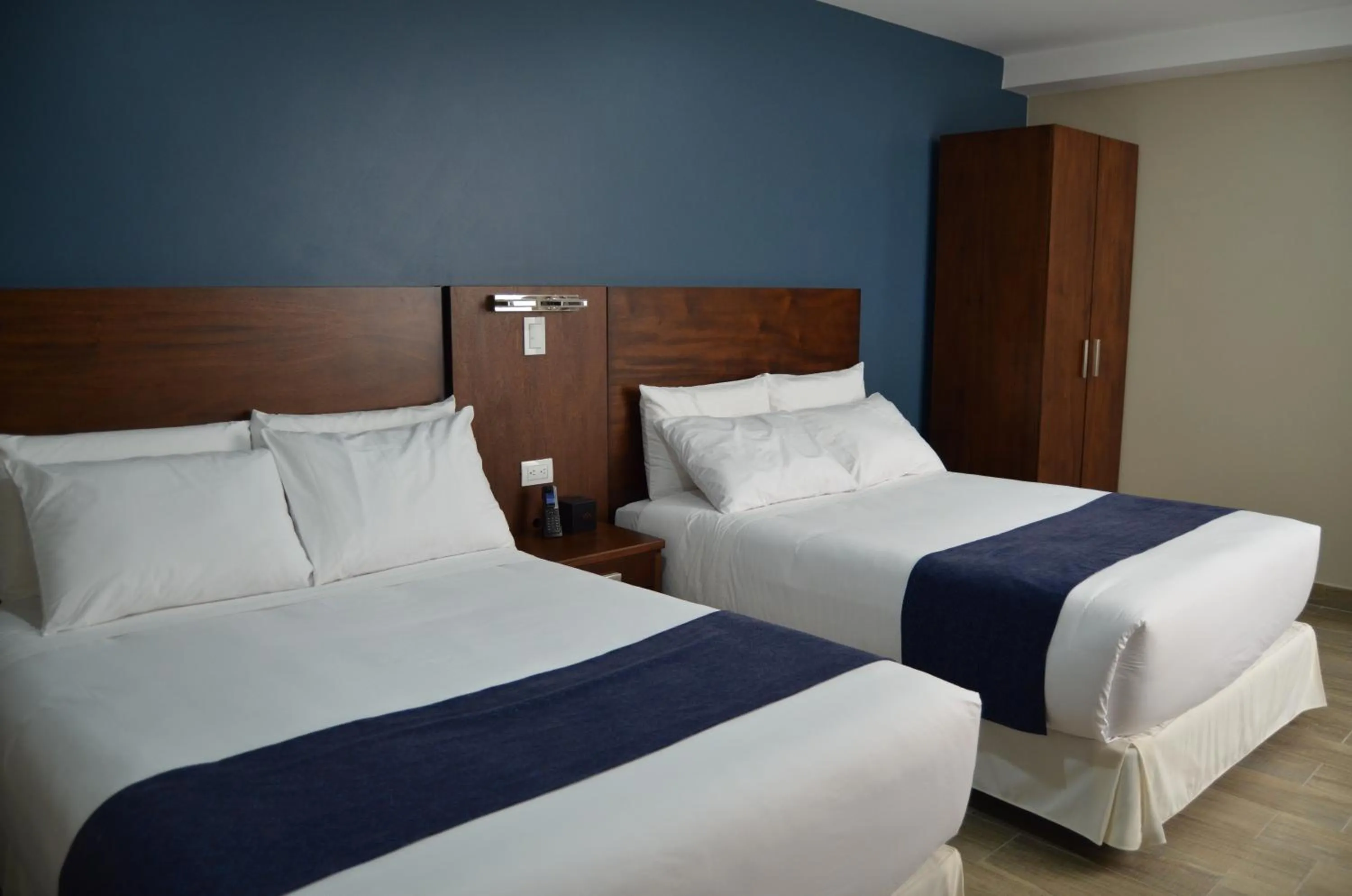 Bed in Hotel San Agustin Plaza