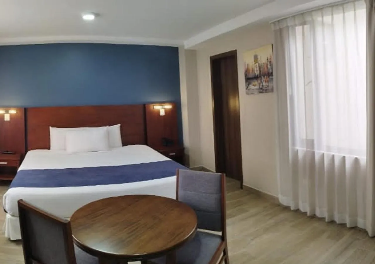 Bed in Hotel San Agustin Plaza