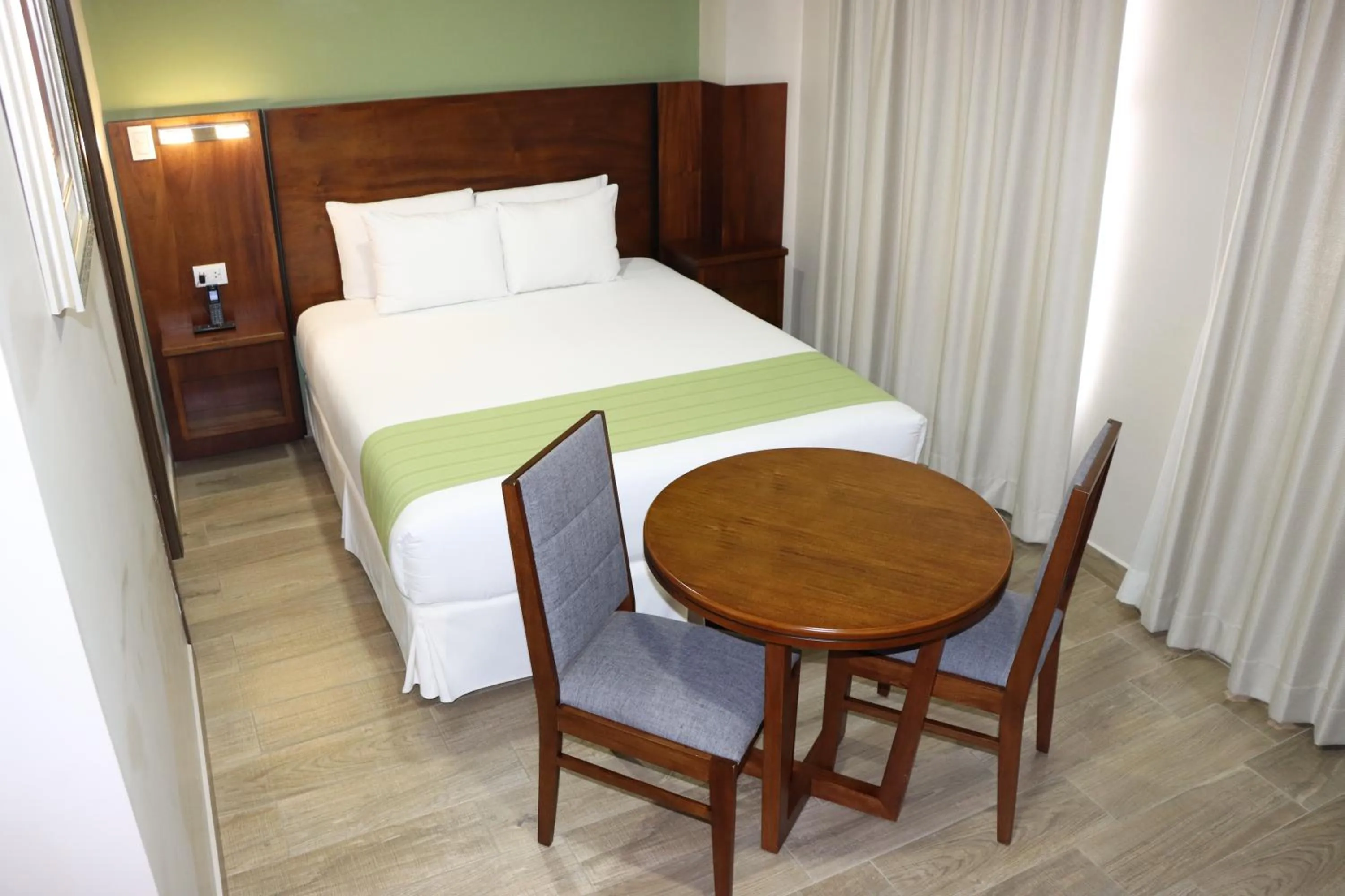Bed in Hotel San Agustin Plaza