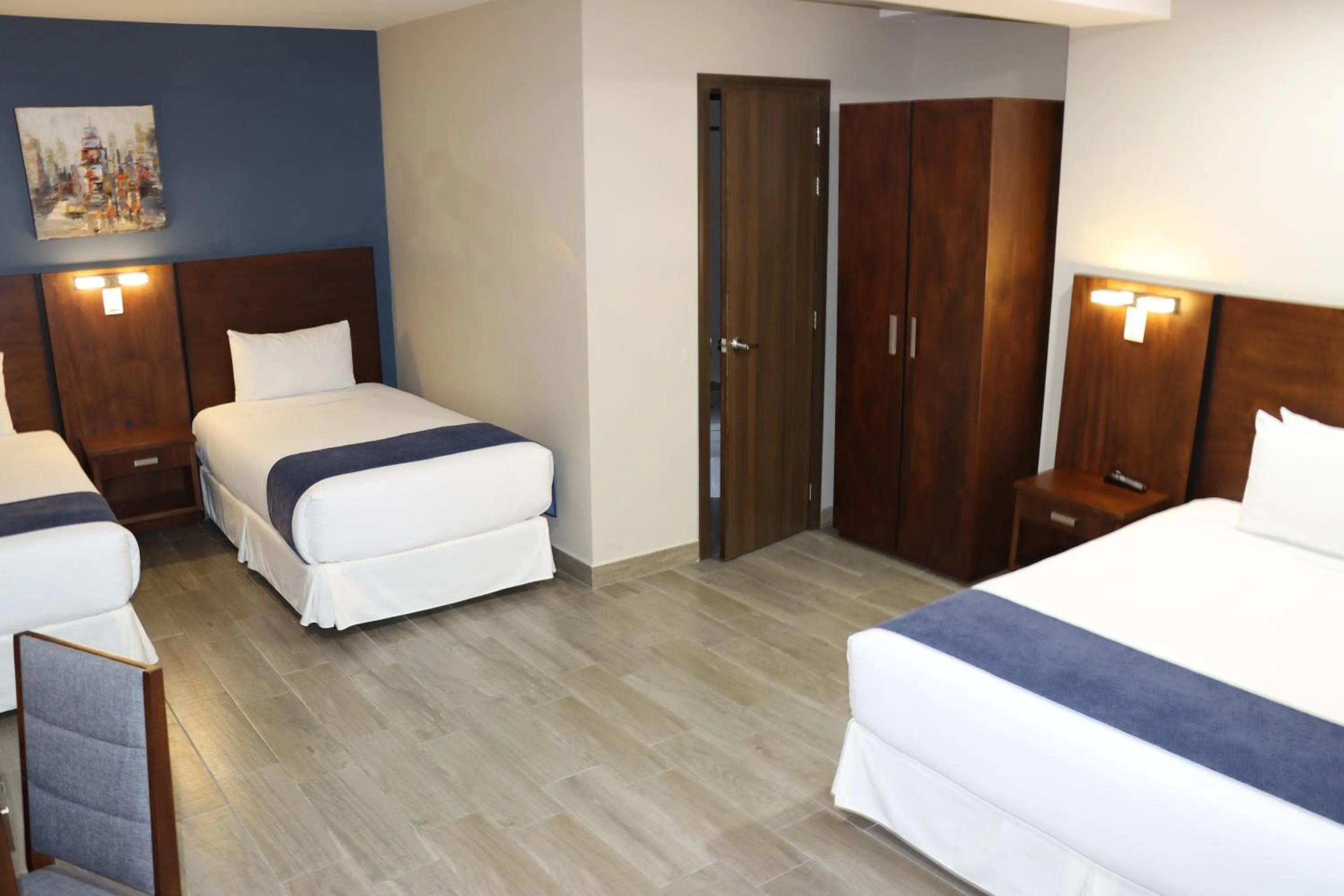 Bed in Hotel San Agustin Plaza