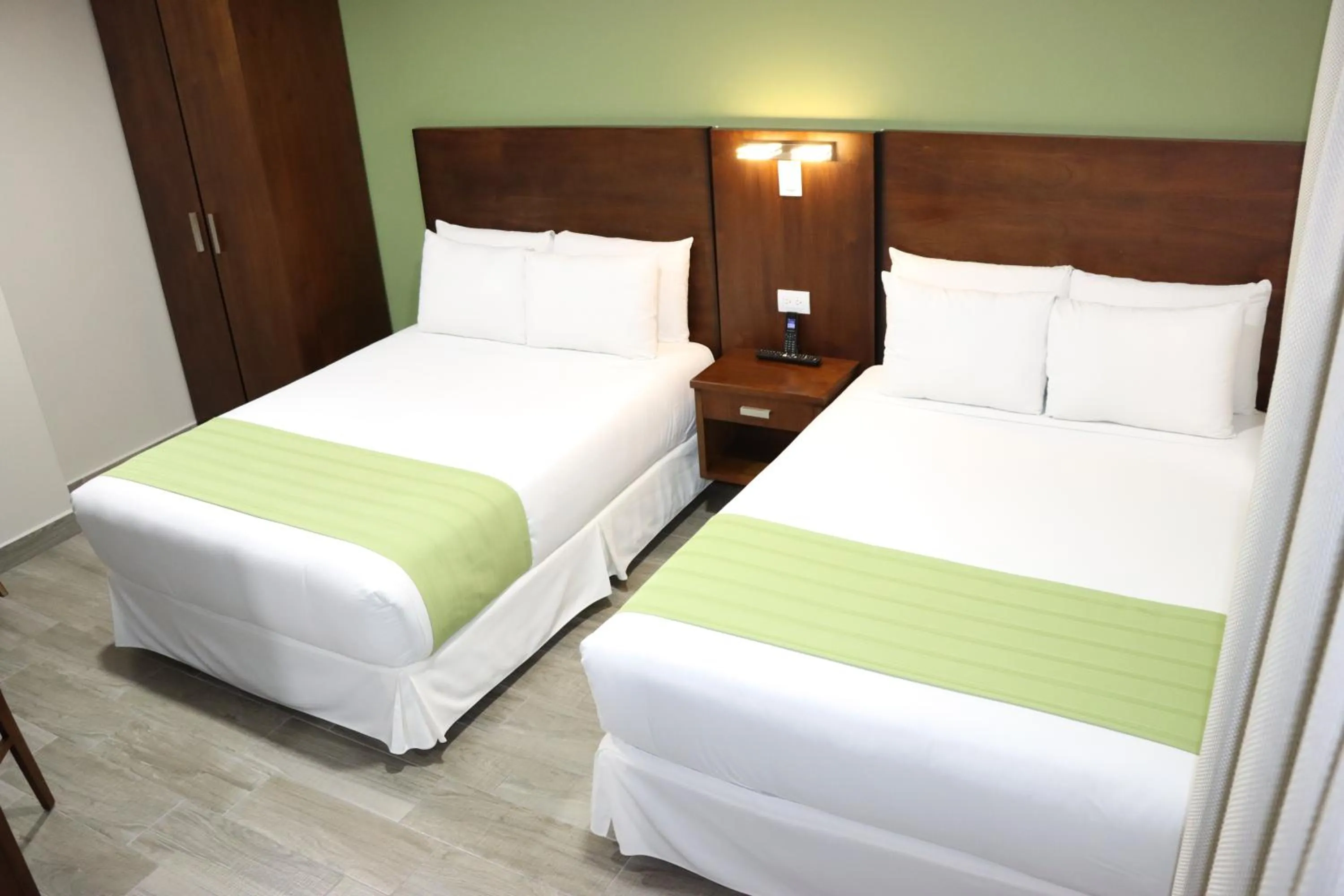 Bed in Hotel San Agustin Plaza