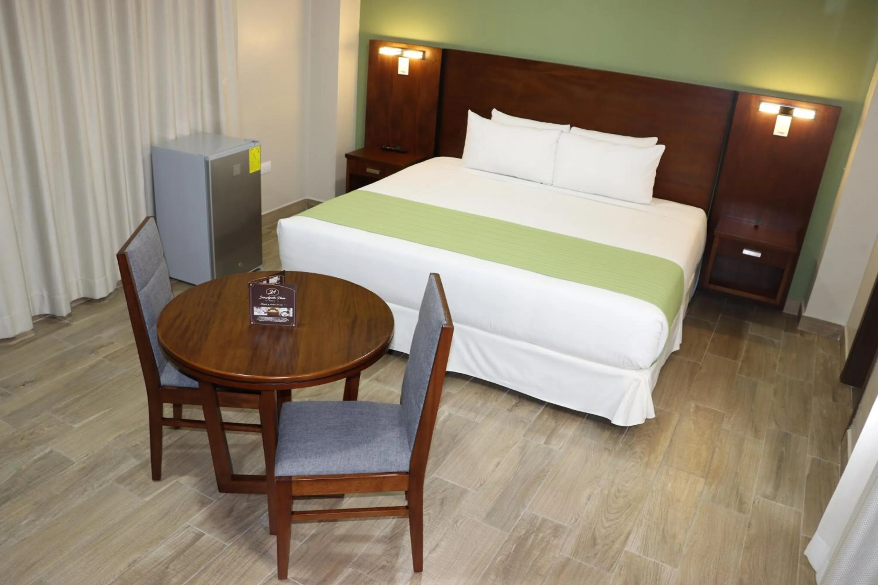 Bed in Hotel San Agustin Plaza