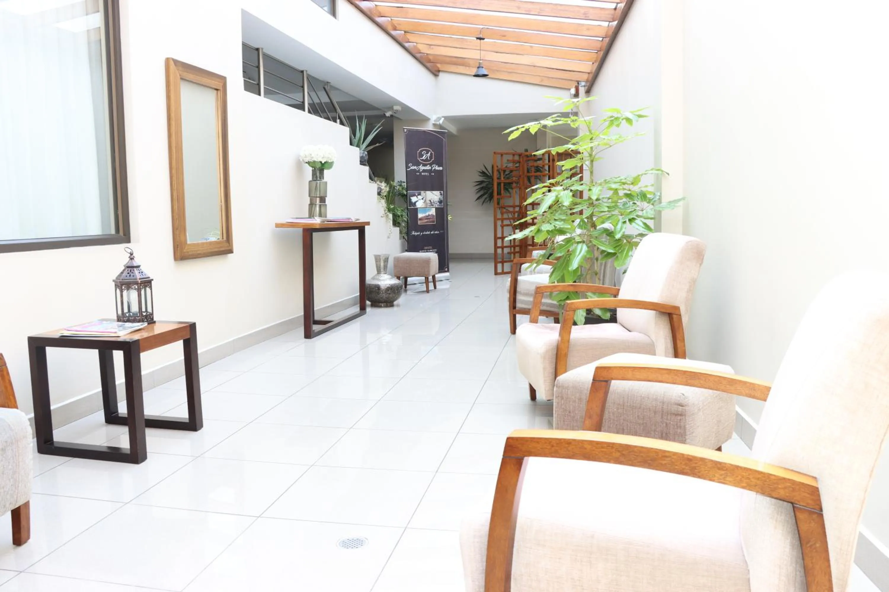 Living room in Hotel San Agustin Plaza