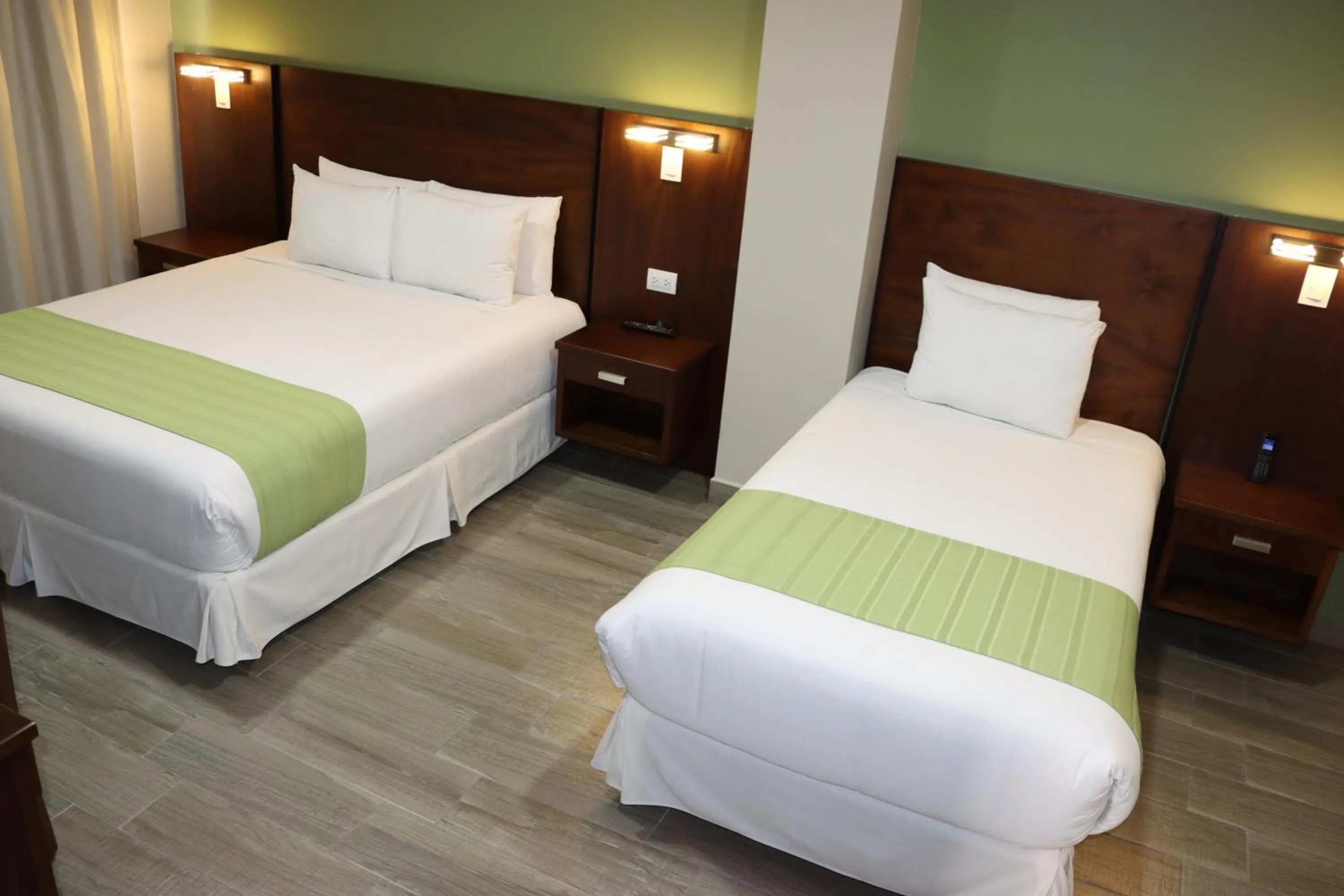 Bed in Hotel San Agustin Plaza