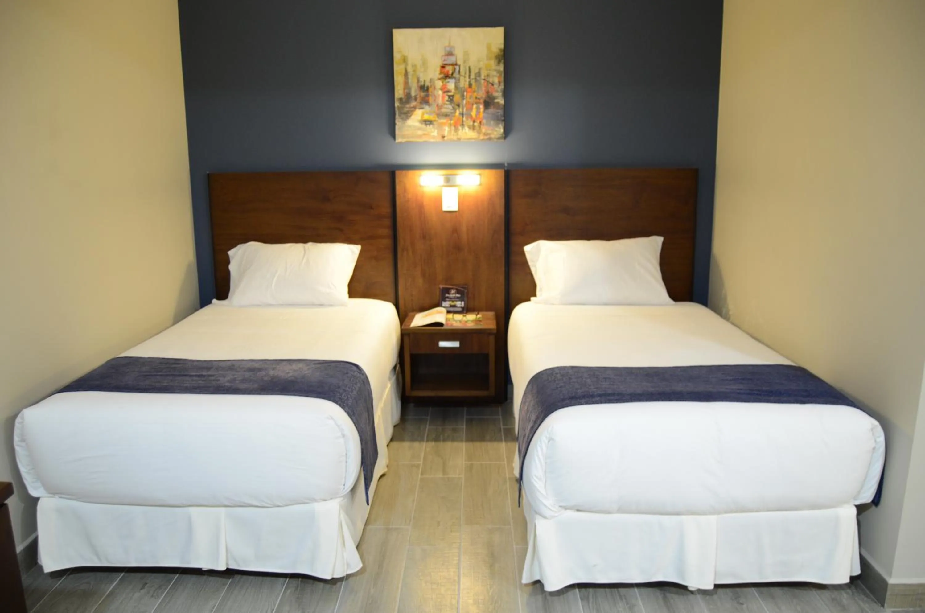 Bed in Hotel San Agustin Plaza