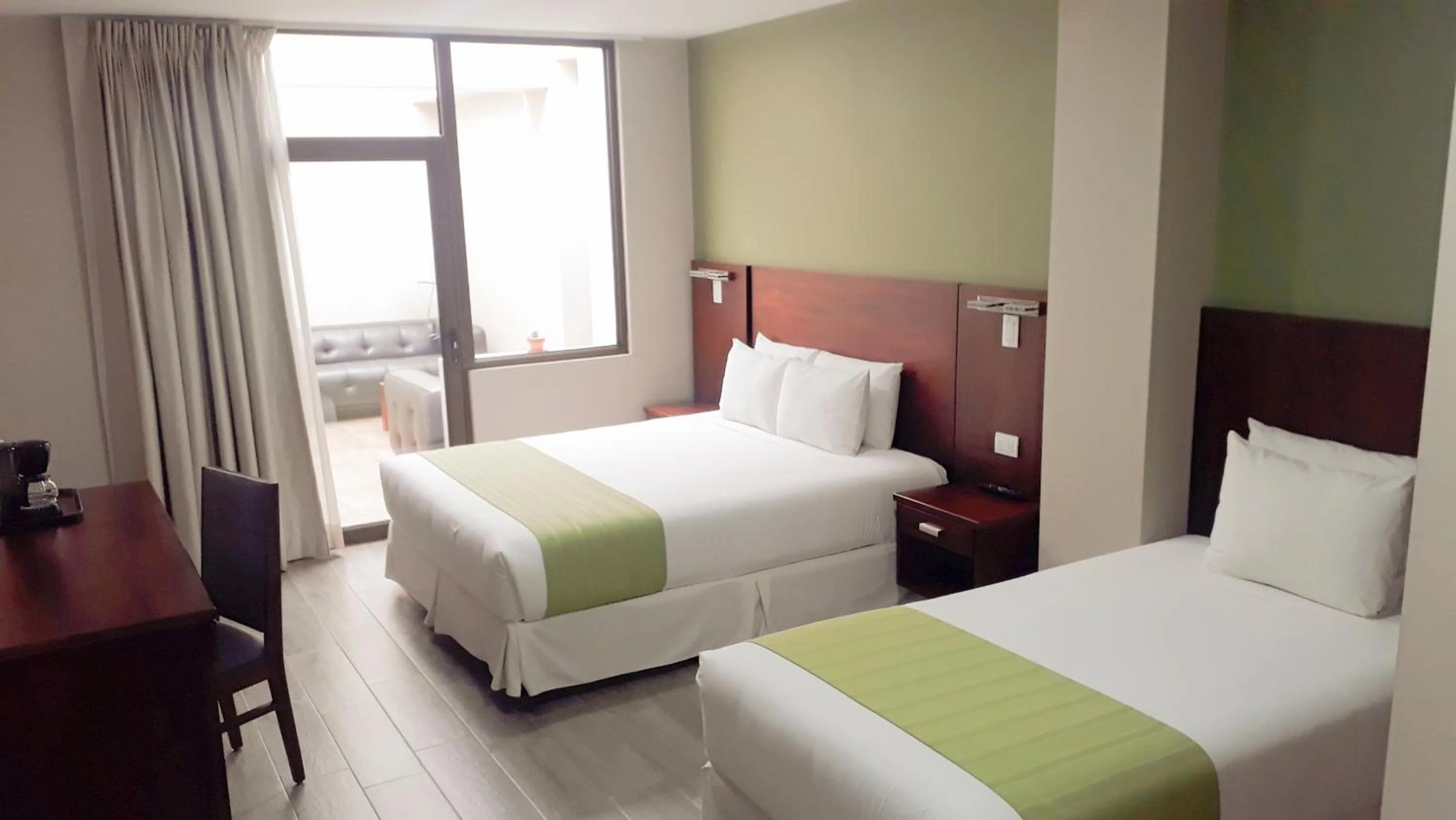 Bed in Hotel San Agustin Plaza