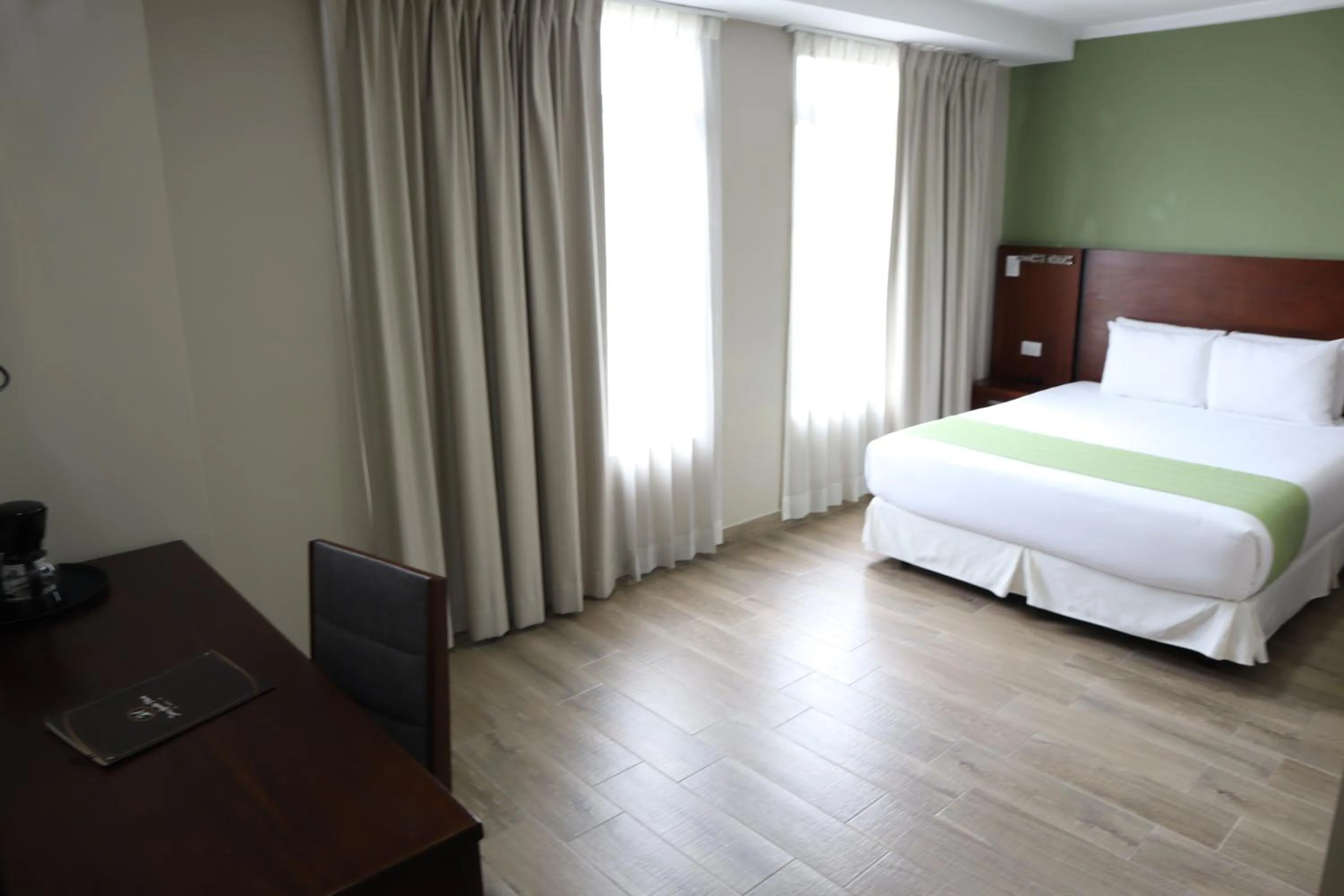 Bed in Hotel San Agustin Plaza