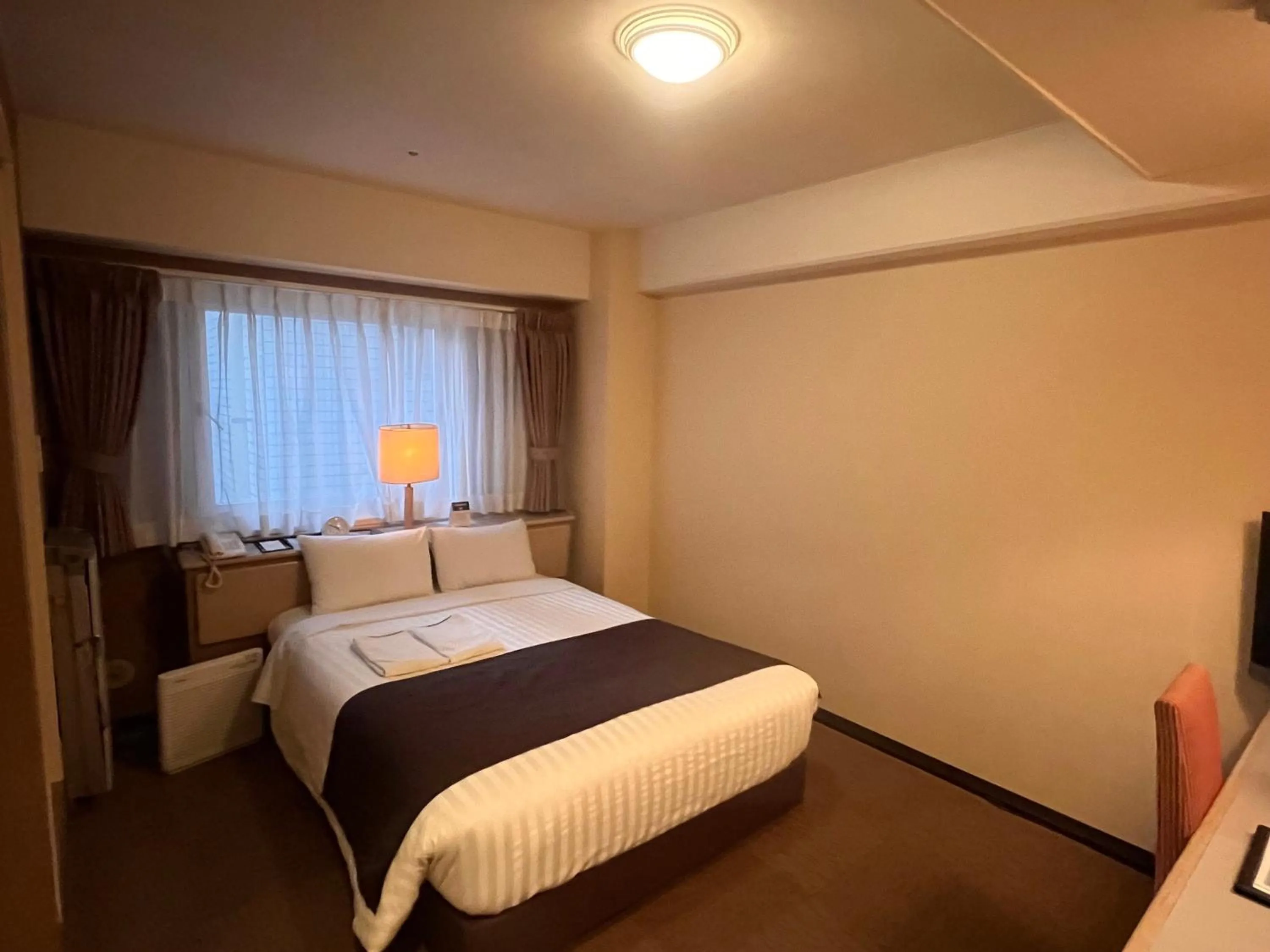 Bed in Hotel Listel Shinjuku