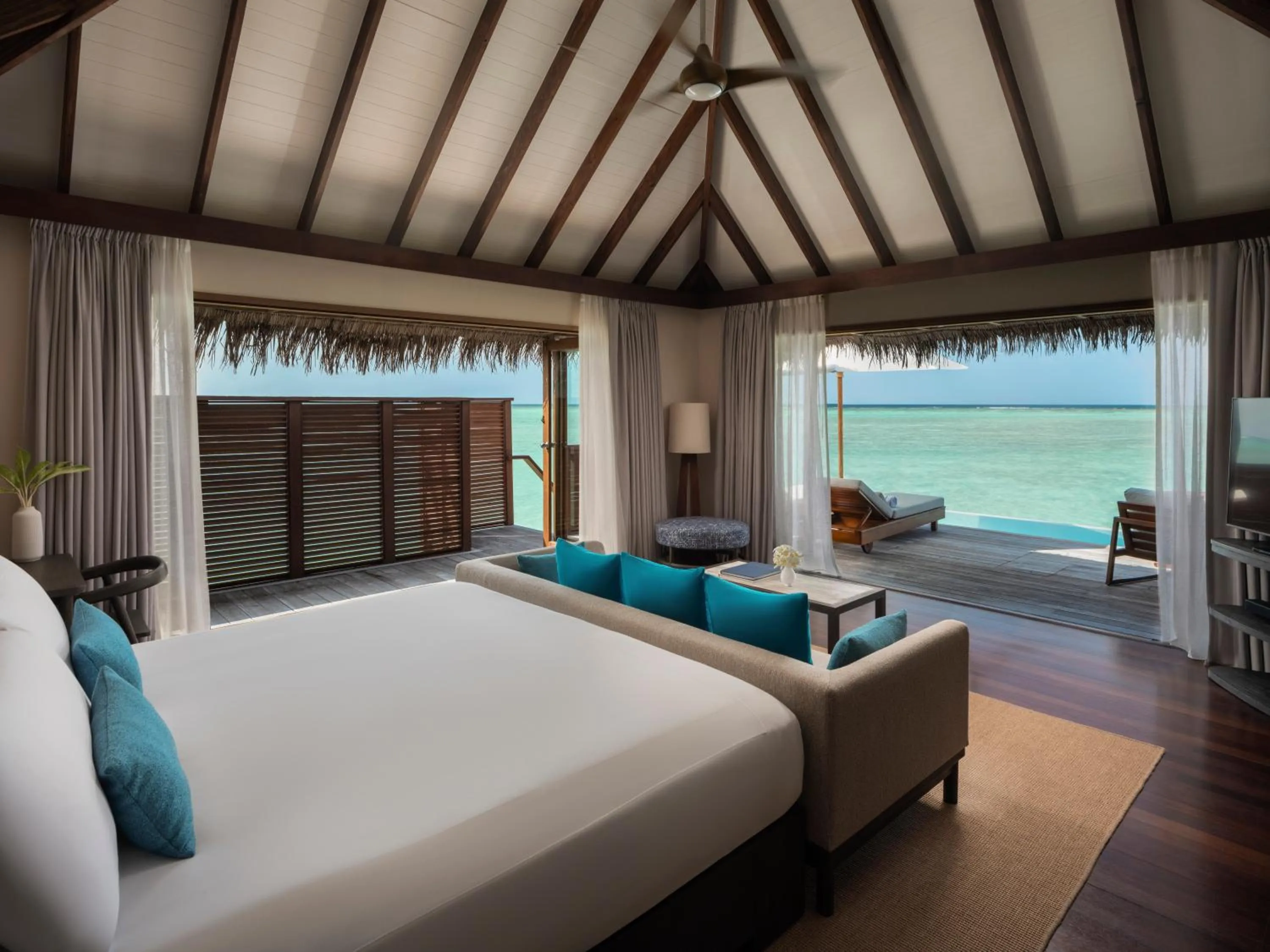 Bed in Conrad Maldives Rangali Island