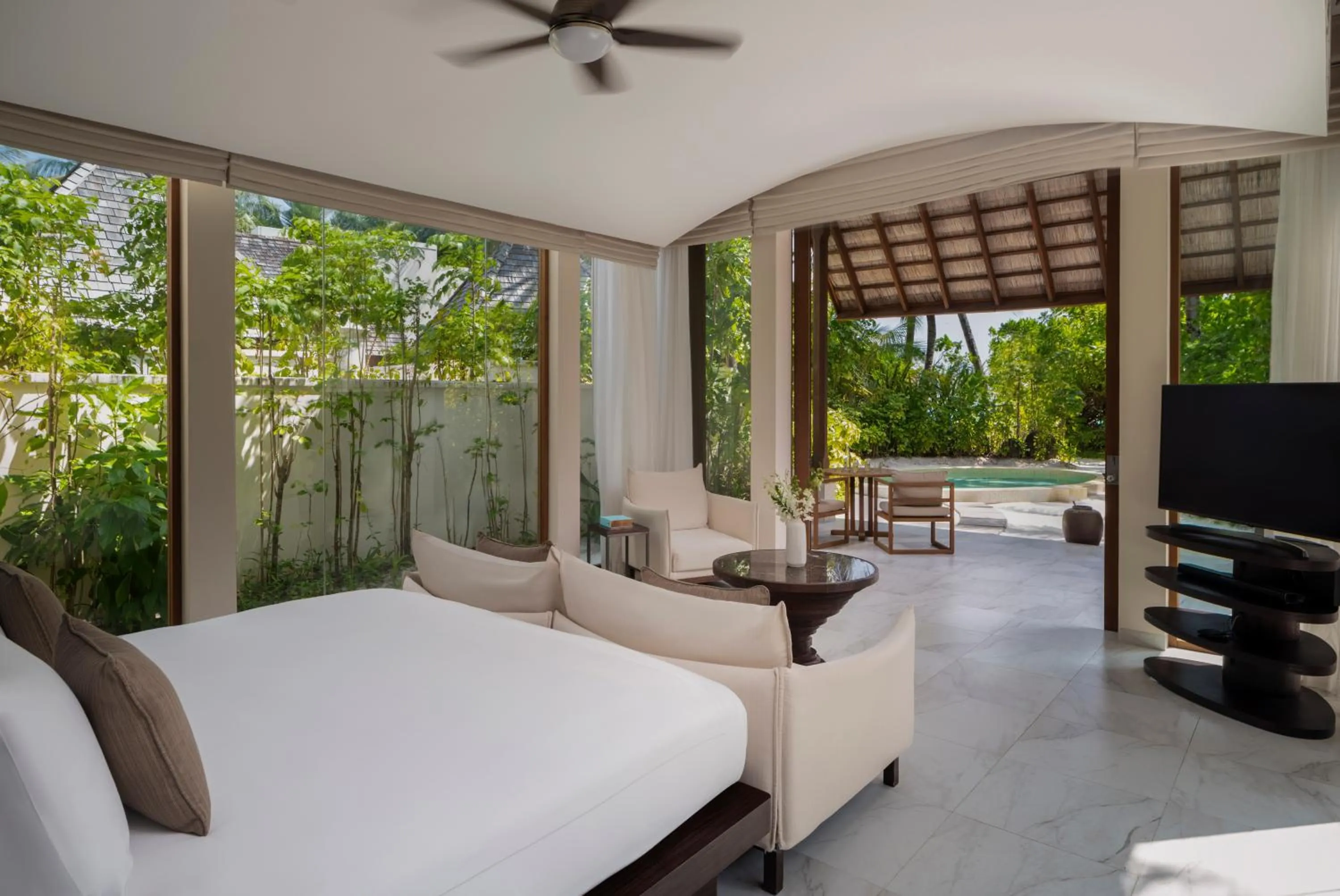 Bed in Conrad Maldives Rangali Island