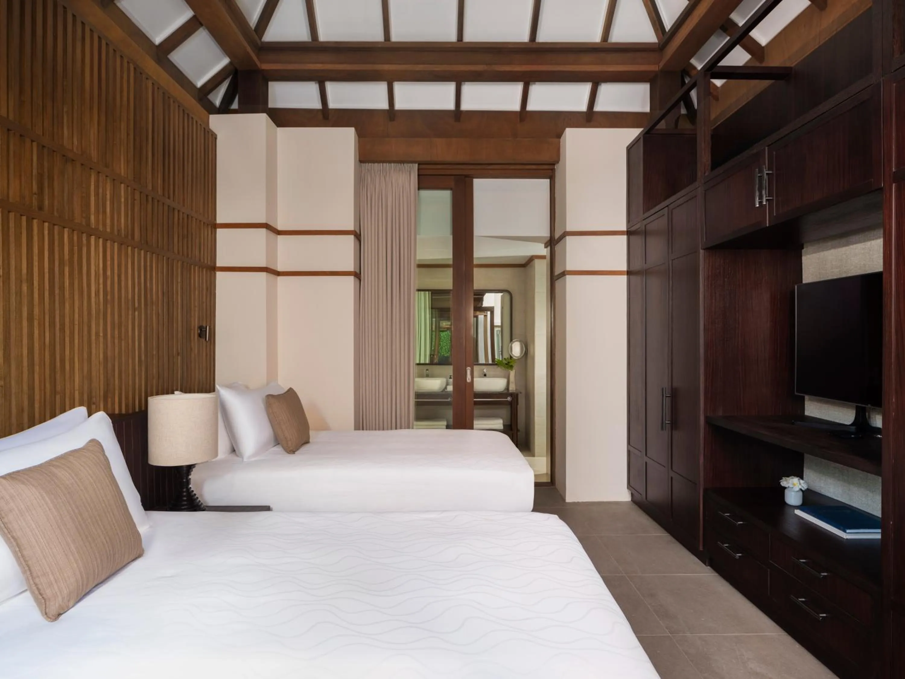 Bed in Conrad Maldives Rangali Island