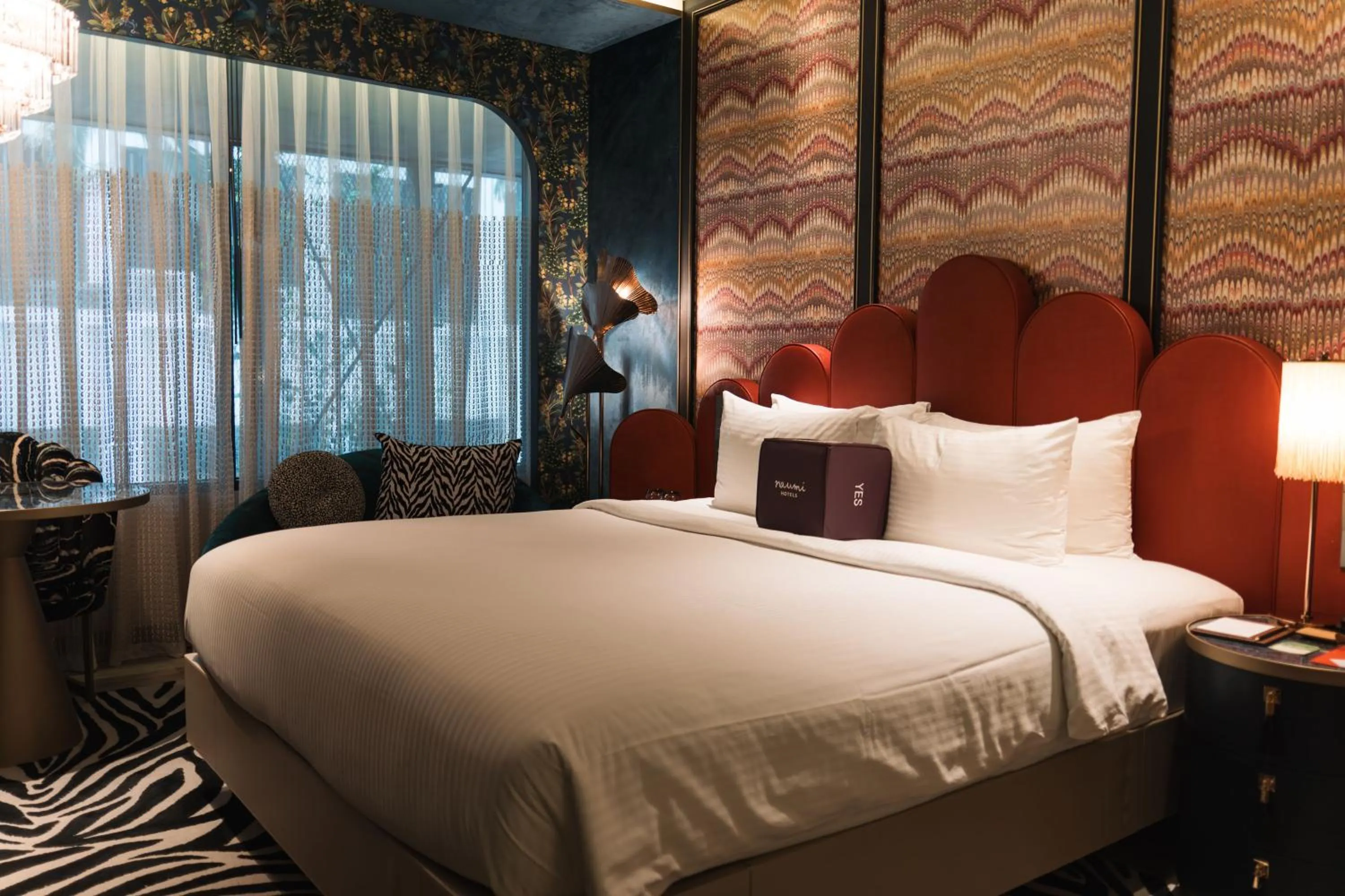 Bed in Naumi Hotel Singapore