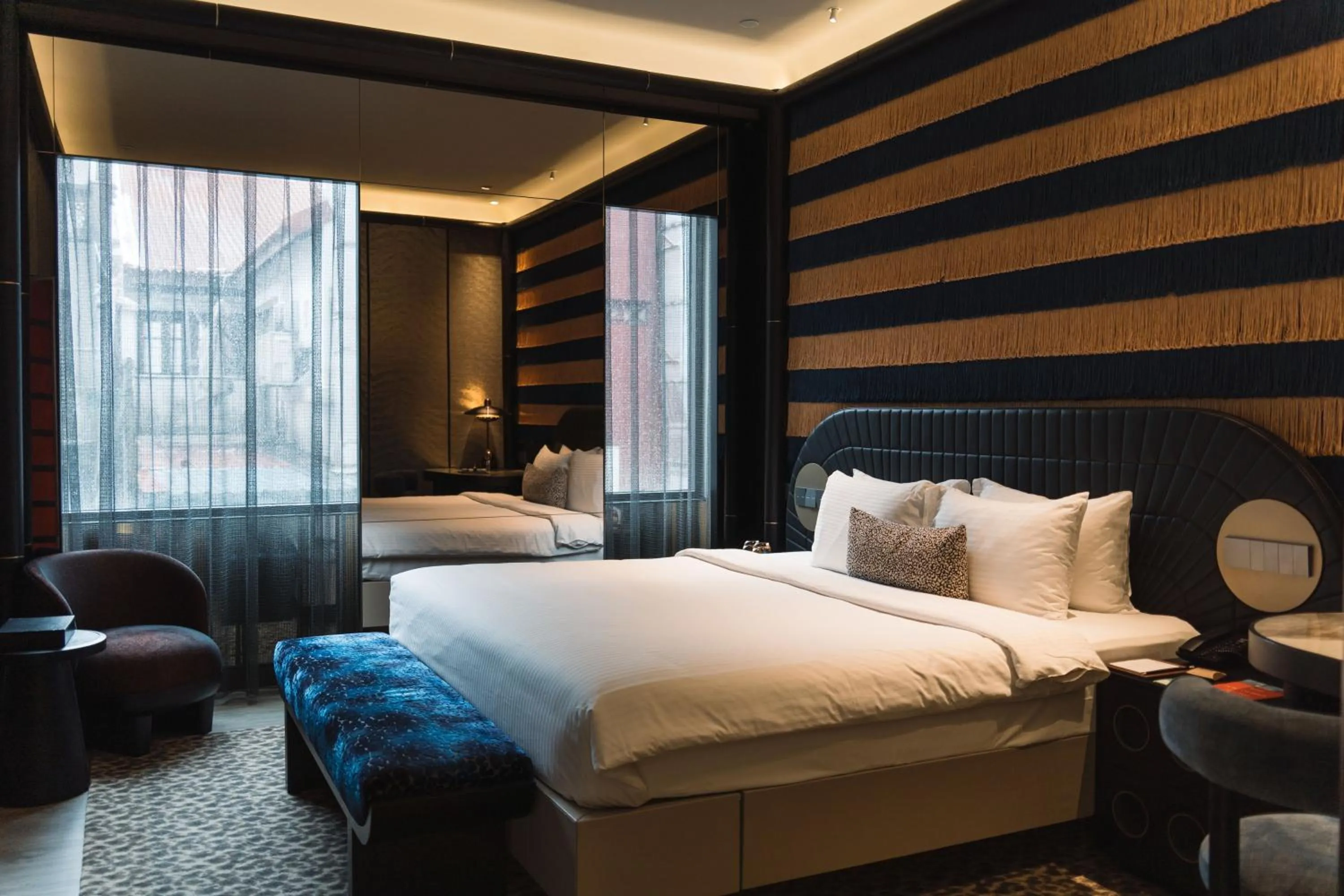 Bed in Naumi Hotel Singapore