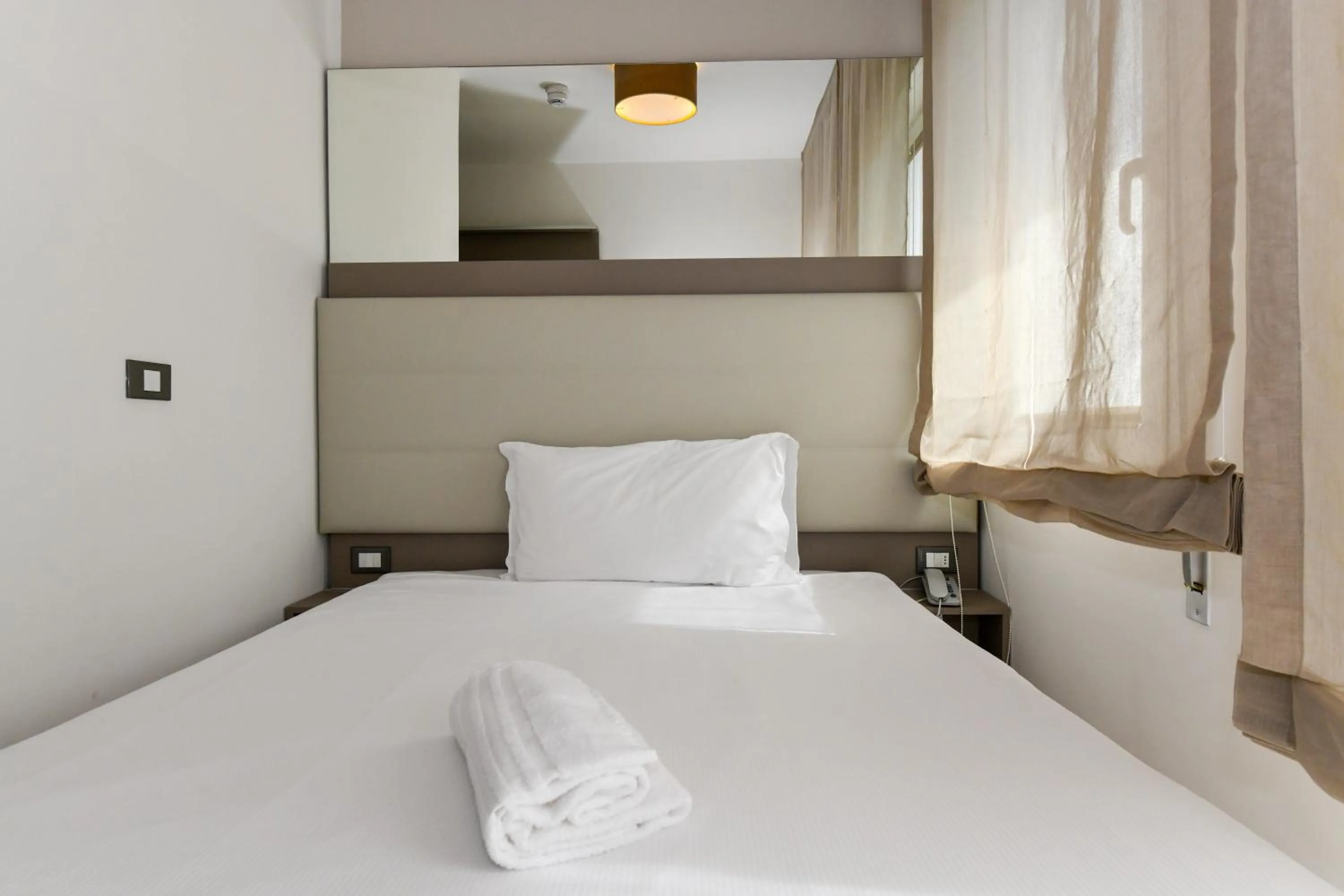 Bed in Hotel Delle Mimose