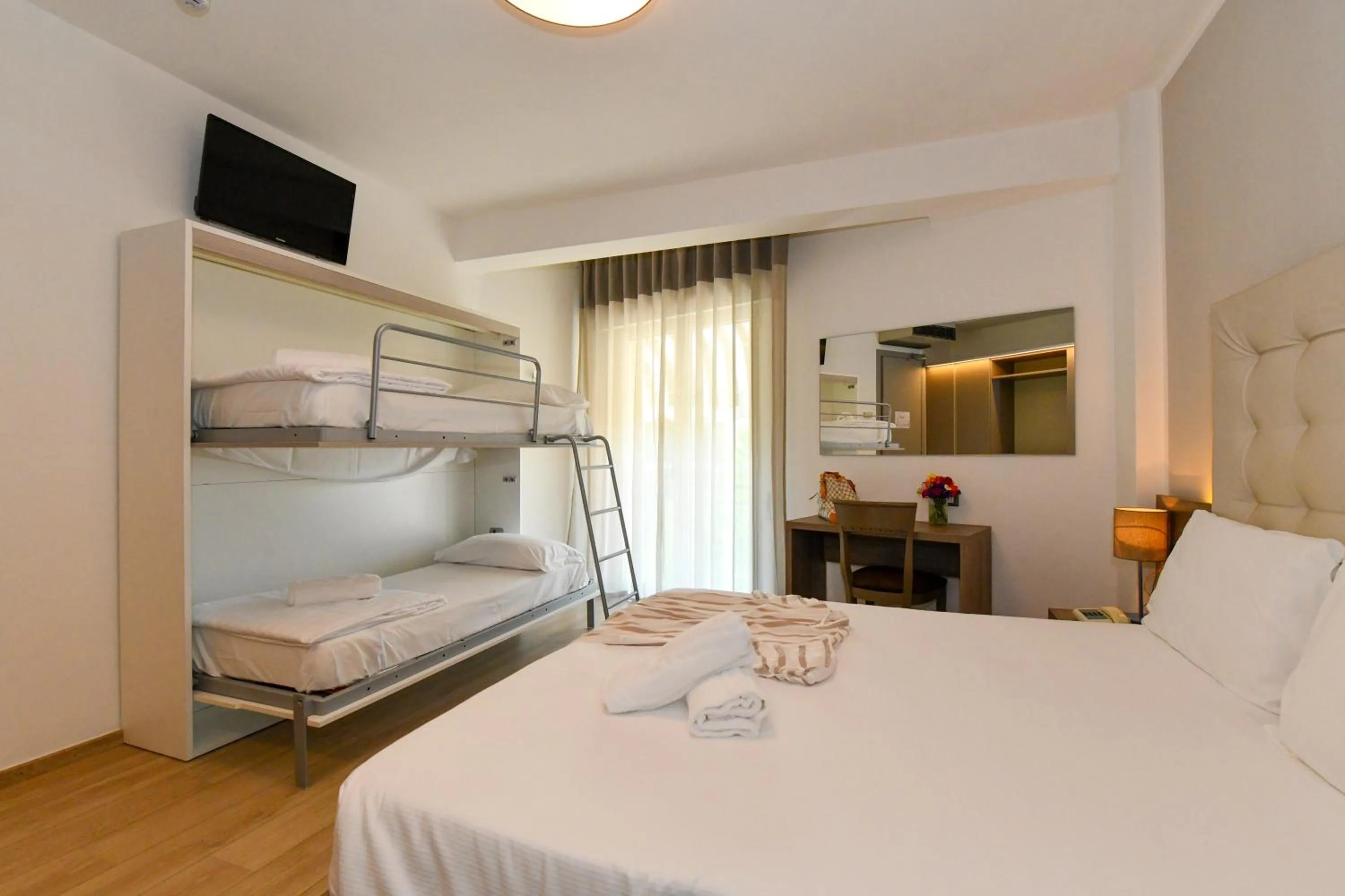 Bed in Hotel Delle Mimose