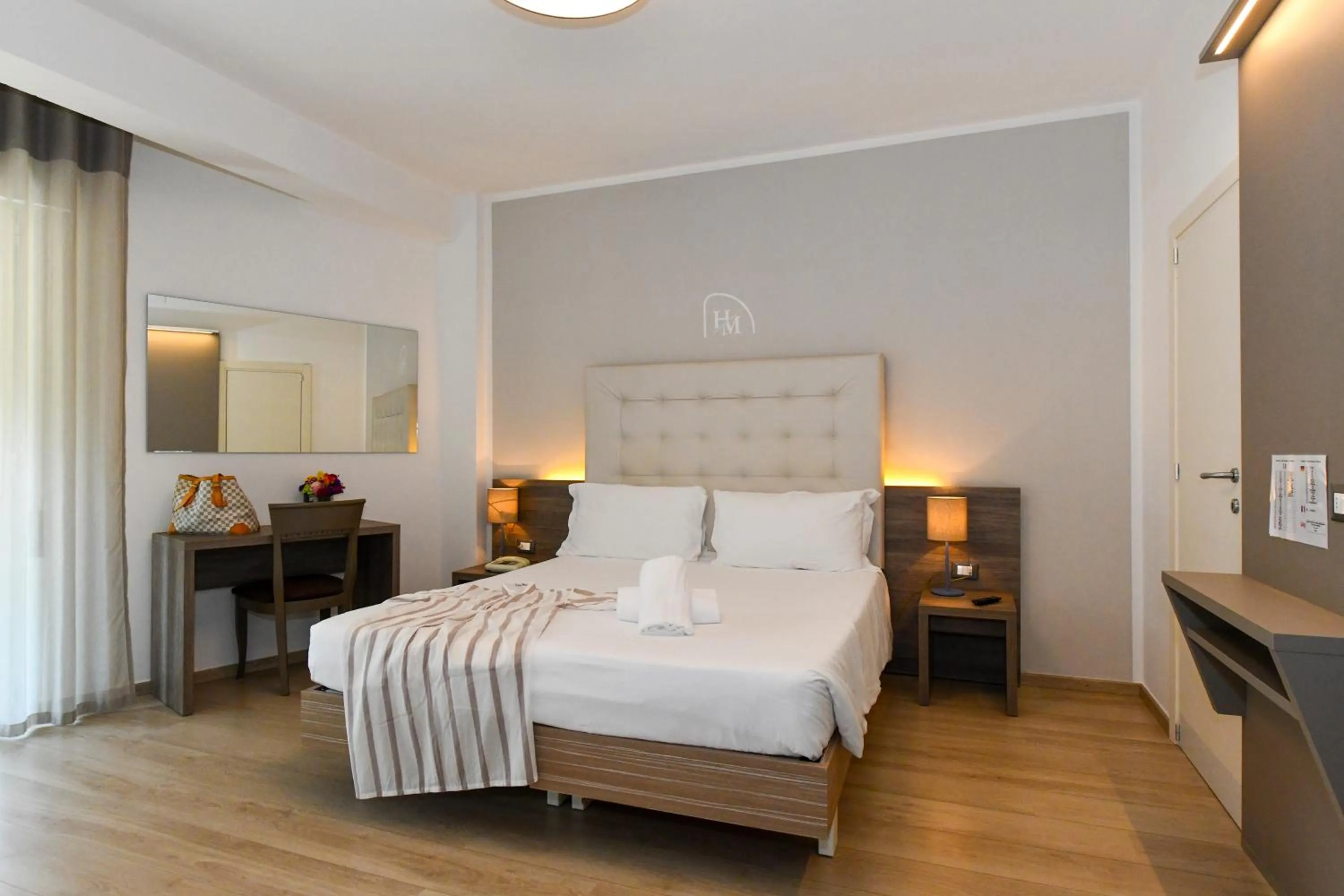 Bed in Hotel Delle Mimose