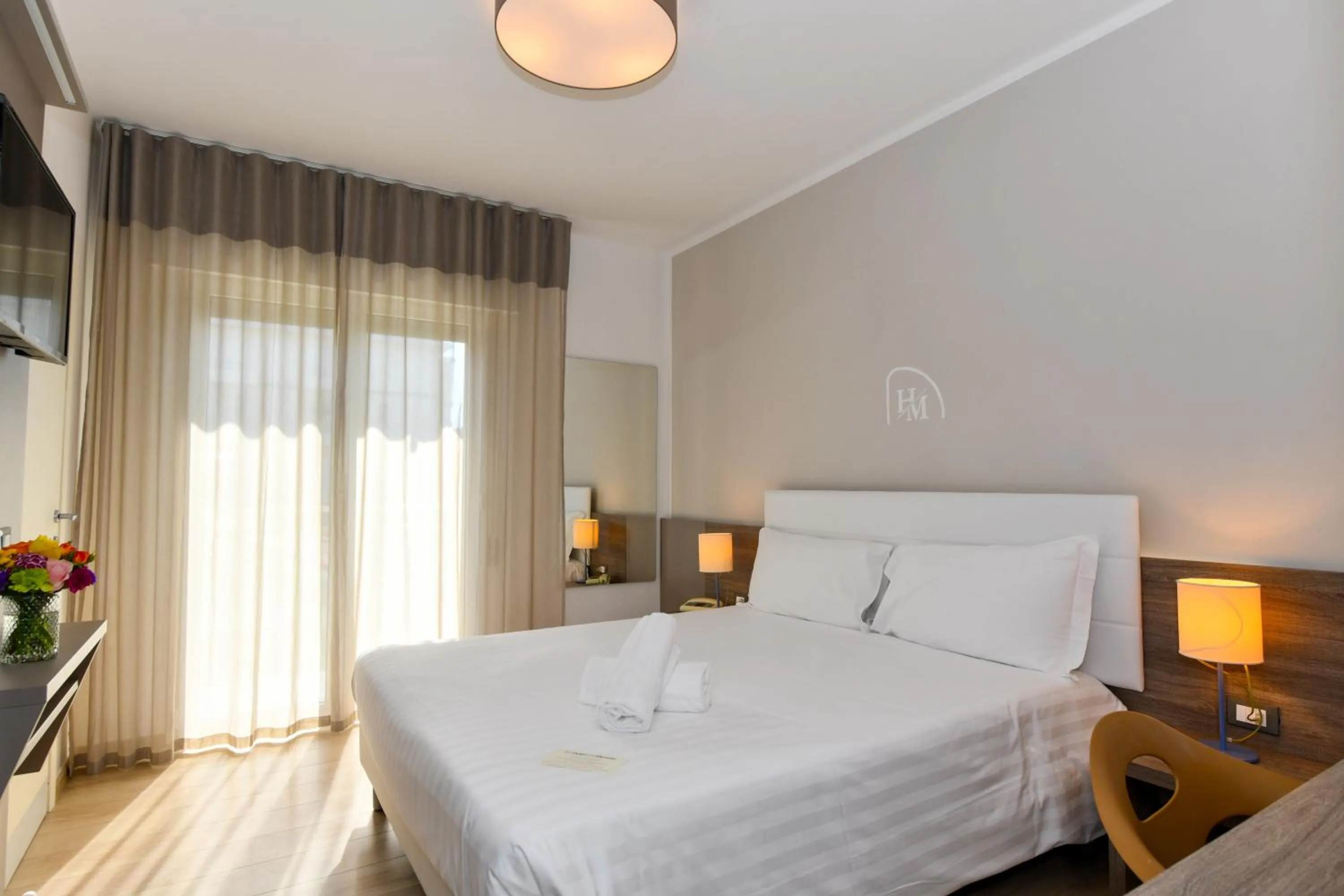 Bed in Hotel Delle Mimose