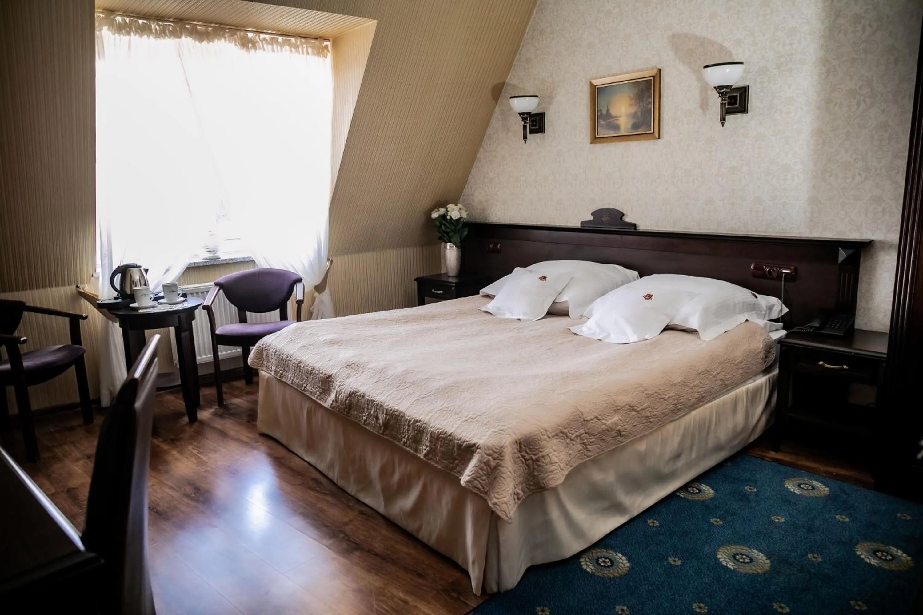 Bed in Oławian Hotel