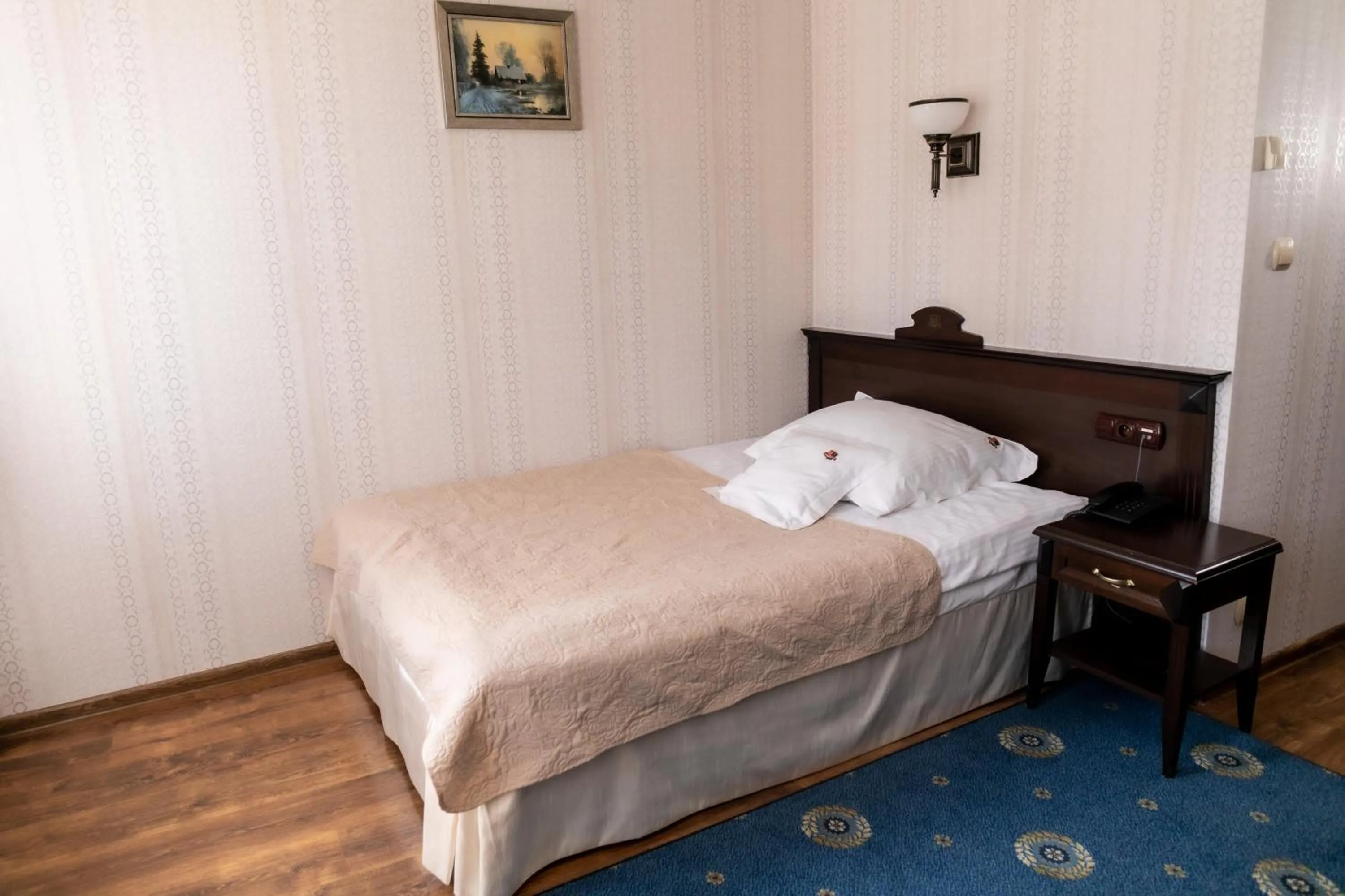 Bed in Oławian Hotel