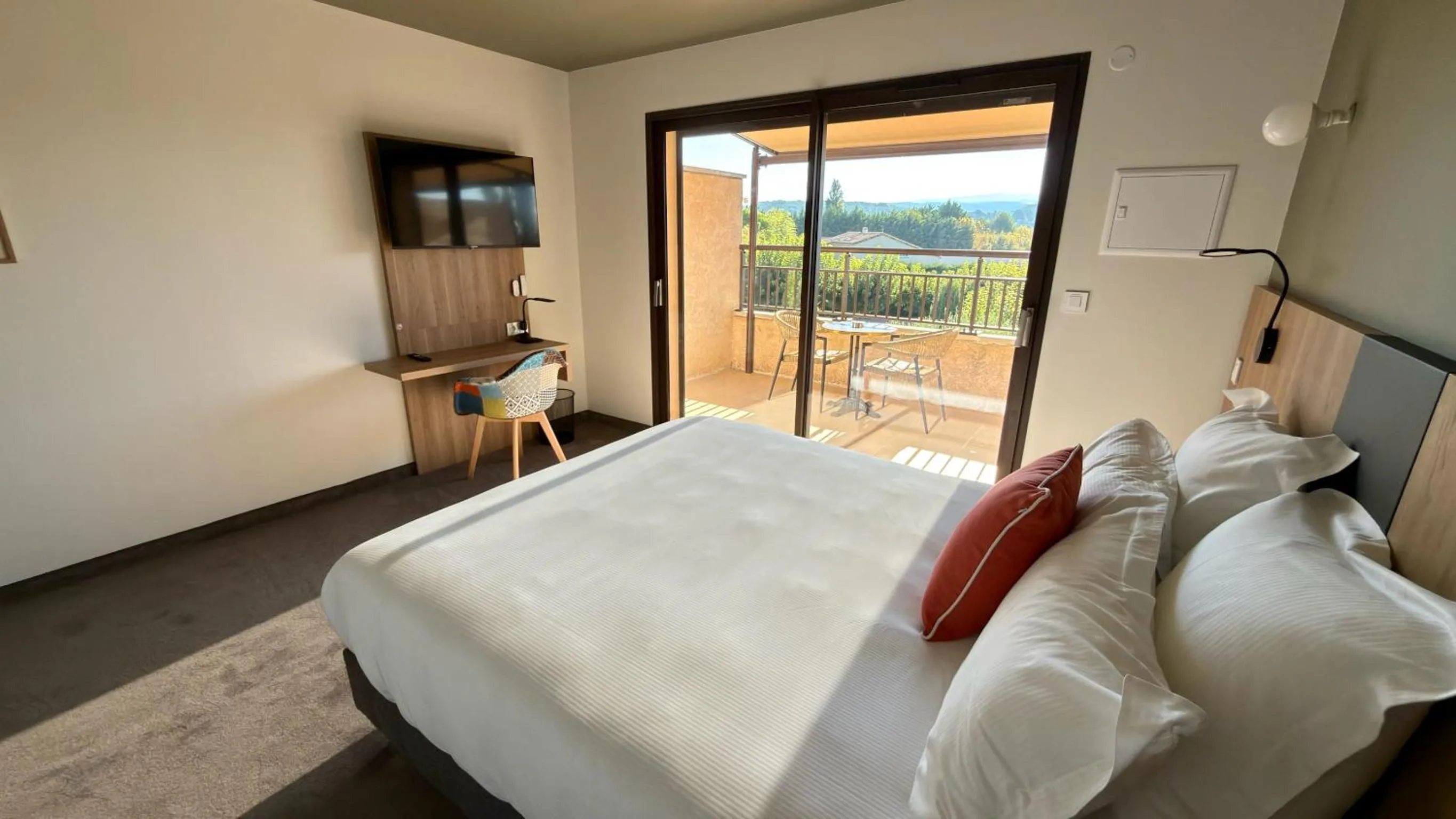 Bed in Hôtel La Perna