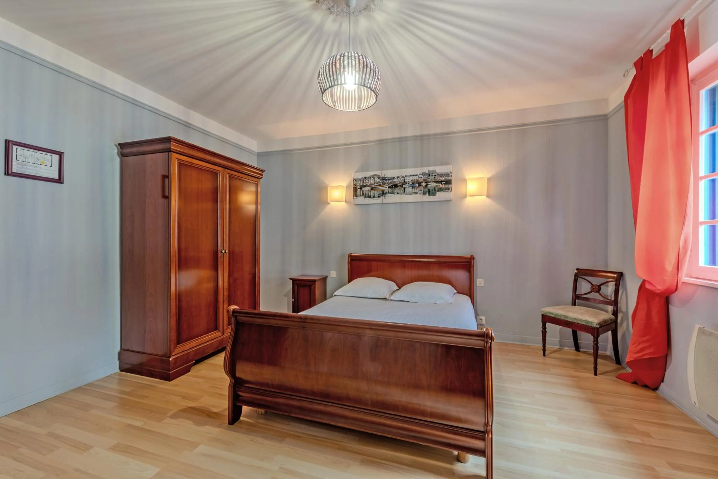 Bed in Logis Hotel De La Corniche